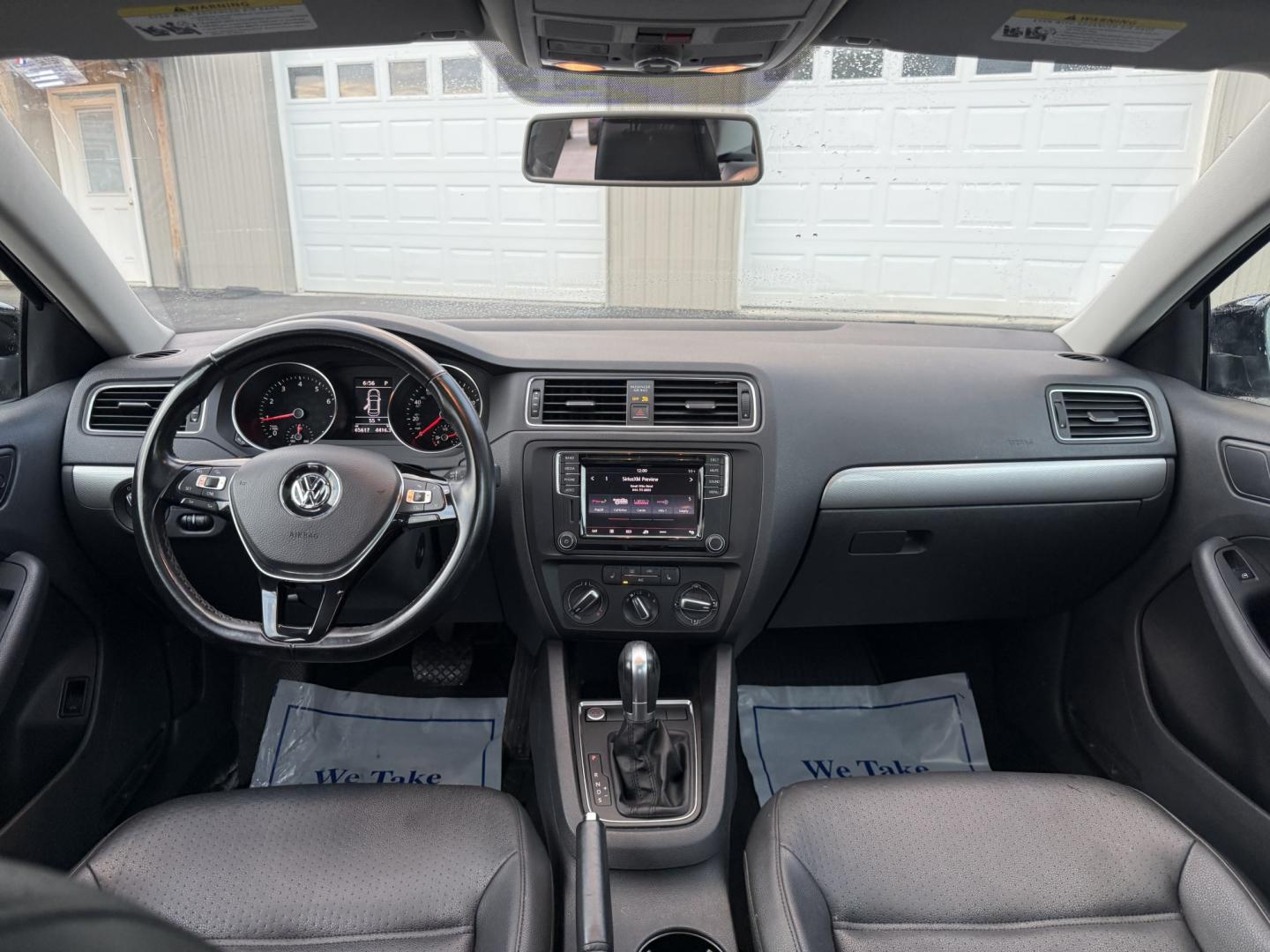 2017 Black /Black Volkswagen Jetta 1.4T SE 6A (3VWDB7AJXHM) with an 1.4L I4 DOHC 20V Turbo engine, Automatic transmission, located at 547 E. Main St., Orwell, OH, 44076, (440) 437-5893, 41.535435, -80.847855 - 2017 Volkswagen Jetta SE – Efficient German Sedan Comfort with Everyday Convenience If you want a compact sedan that feels a little more refined than a basic commuter car, this 2017 Volkswagen Jetta SE is a strong option. The 1.4L Turbocharged engine and 6-speed automatic deliver smooth everyday- Photo#22