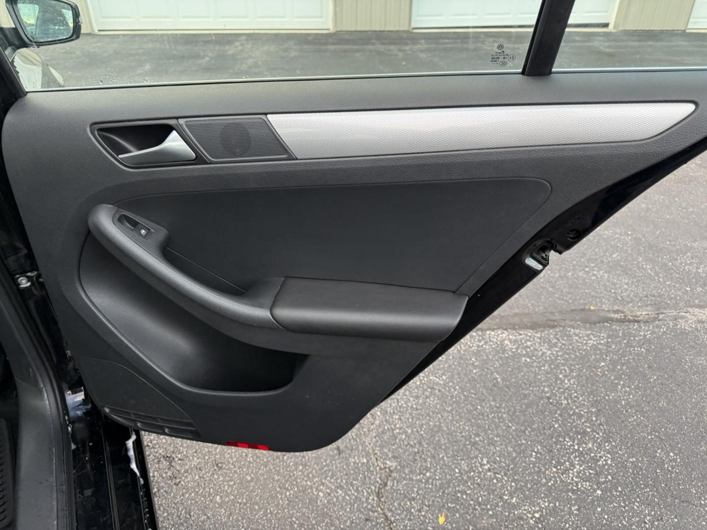 2017 Black /Black Volkswagen Jetta 1.4T SE 6A (3VWDB7AJXHM) with an 1.4L I4 DOHC 20V Turbo engine, Automatic transmission, located at 547 E. Main St., Orwell, OH, 44076, (440) 437-5893, 41.535435, -80.847855 - 2017 Volkswagen Jetta SE – Efficient German Sedan Comfort with Everyday Convenience If you want a compact sedan that feels a little more refined than a basic commuter car, this 2017 Volkswagen Jetta SE is a strong option. The 1.4L Turbocharged engine and 6-speed automatic deliver smooth everyday- Photo#41