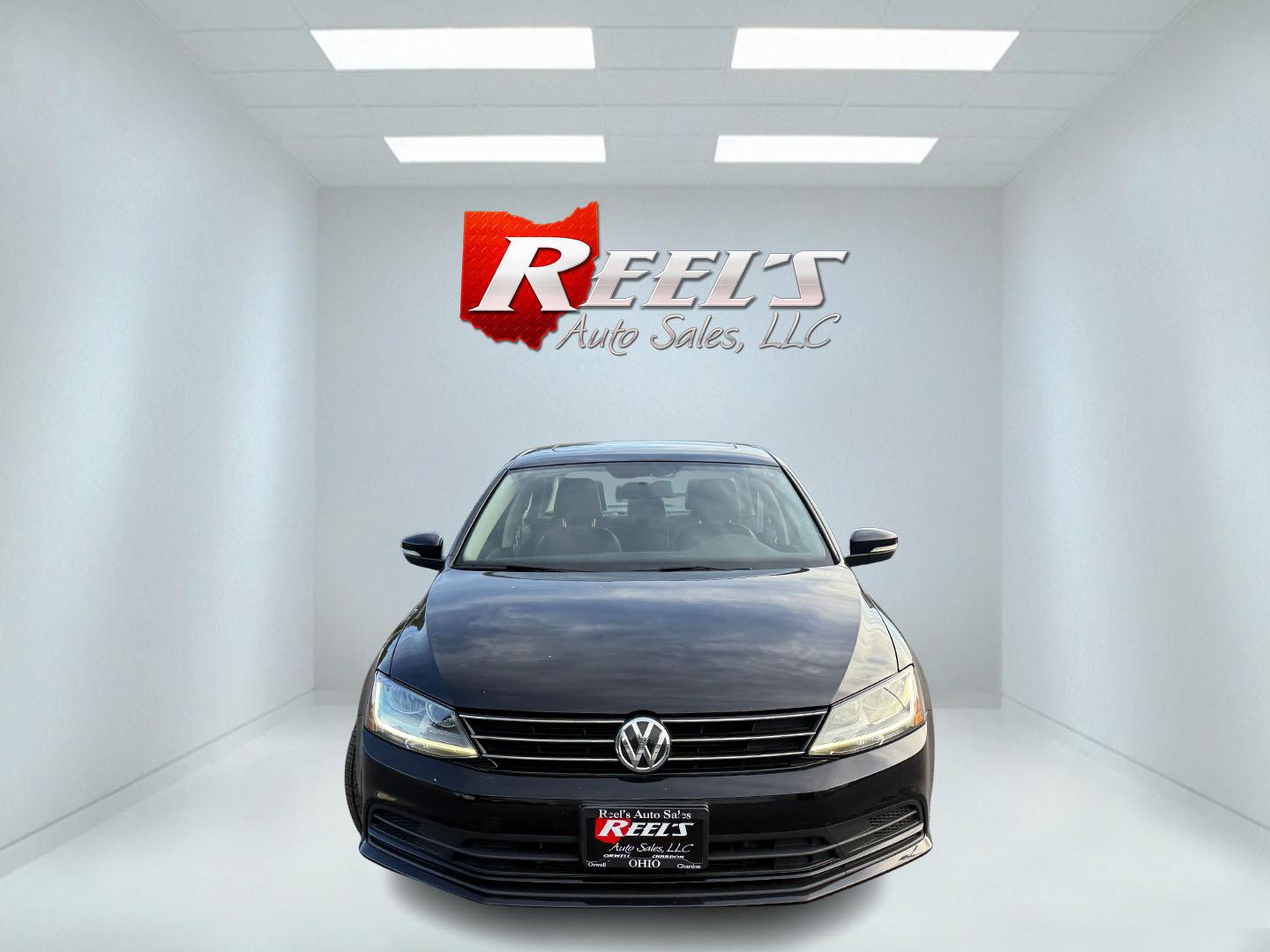 2017 Black /Black Volkswagen Jetta 1.4T SE 6A (3VWDB7AJXHM) with an 1.4L I4 DOHC 20V Turbo engine, Automatic transmission, located at 547 E. Main St., Orwell, OH, 44076, (440) 437-5893, 41.535435, -80.847855 - 2017 Volkswagen Jetta SE – Efficient German Sedan Comfort with Everyday Convenience If you want a compact sedan that feels a little more refined than a basic commuter car, this 2017 Volkswagen Jetta SE is a strong option. The 1.4L Turbocharged engine and 6-speed automatic deliver smooth everyday- Photo#1