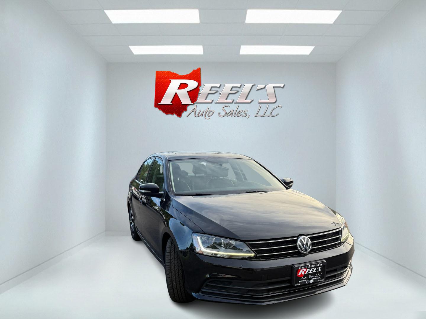 2017 Black /Black Volkswagen Jetta 1.4T SE 6A (3VWDB7AJXHM) with an 1.4L I4 DOHC 20V Turbo engine, Automatic transmission, located at 547 E. Main St., Orwell, OH, 44076, (440) 437-5893, 41.535435, -80.847855 - 2017 Volkswagen Jetta SE – Efficient German Sedan Comfort with Everyday Convenience If you want a compact sedan that feels a little more refined than a basic commuter car, this 2017 Volkswagen Jetta SE is a strong option. The 1.4L Turbocharged engine and 6-speed automatic deliver smooth everyday- Photo#2
