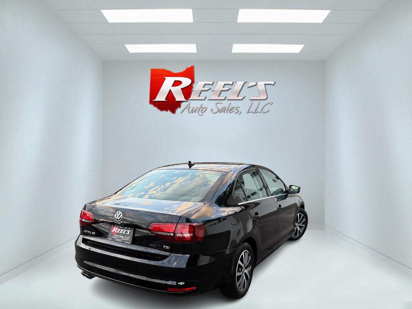 2017 Black /Black Volkswagen Jetta 1.4T SE 6A (3VWDB7AJXHM) with an 1.4L I4 DOHC 20V Turbo engine, Automatic transmission, located at 547 E. Main St., Orwell, OH, 44076, (440) 437-5893, 41.535435, -80.847855 - 2017 Volkswagen Jetta SE – Efficient German Sedan Comfort with Everyday Convenience If you want a compact sedan that feels a little more refined than a basic commuter car, this 2017 Volkswagen Jetta SE is a strong option. The 1.4L Turbocharged engine and 6-speed automatic deliver smooth everyday- Photo#28