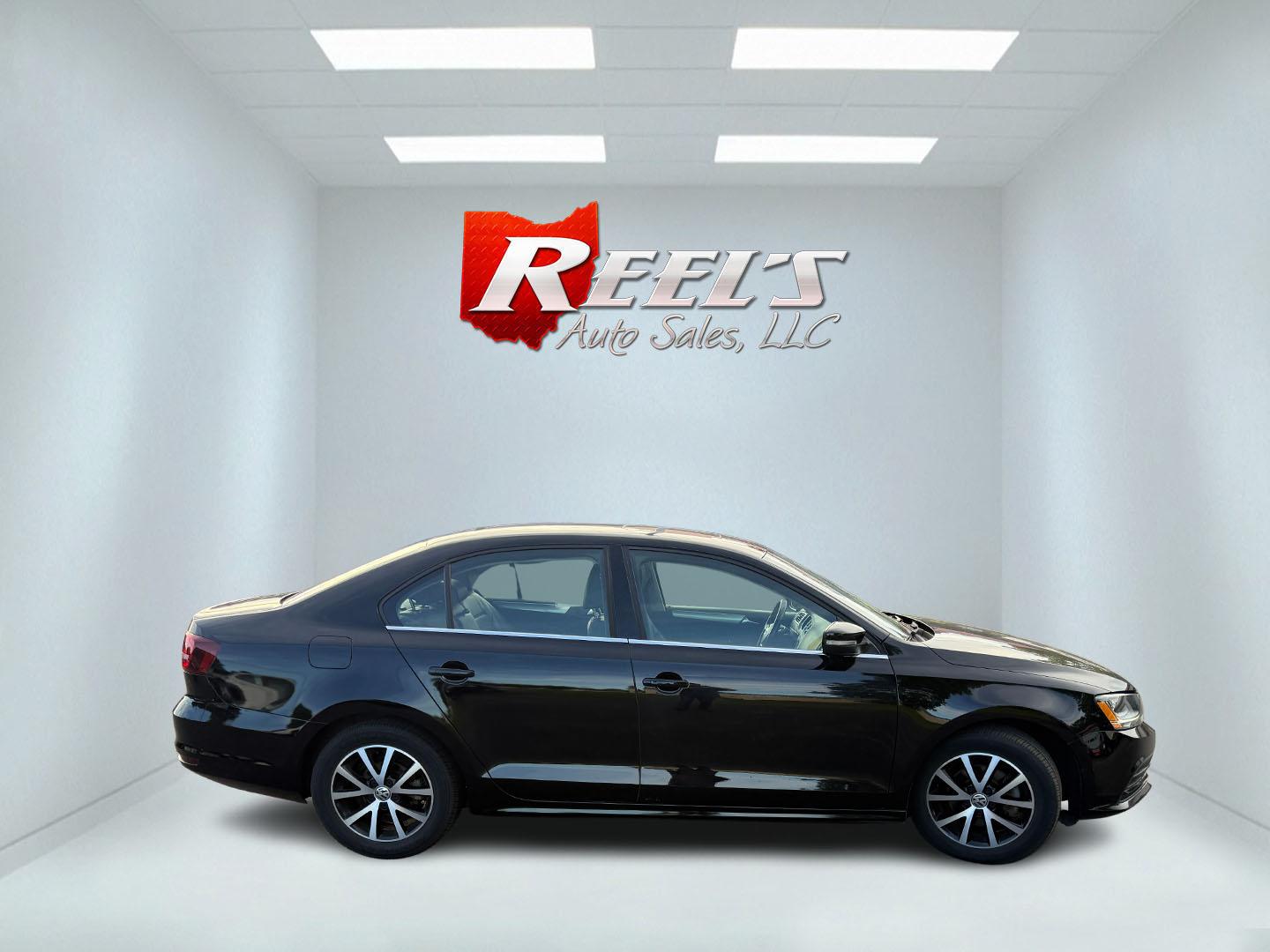 2017 Black /Black Volkswagen Jetta 1.4T SE 6A (3VWDB7AJXHM) with an 1.4L I4 DOHC 20V Turbo engine, Automatic transmission, located at 547 E. Main St., Orwell, OH, 44076, (440) 437-5893, 41.535435, -80.847855 - 2017 Volkswagen Jetta SE – Efficient German Sedan Comfort with Everyday Convenience If you want a compact sedan that feels a little more refined than a basic commuter car, this 2017 Volkswagen Jetta SE is a strong option. The 1.4L Turbocharged engine and 6-speed automatic deliver smooth everyday- Photo#26