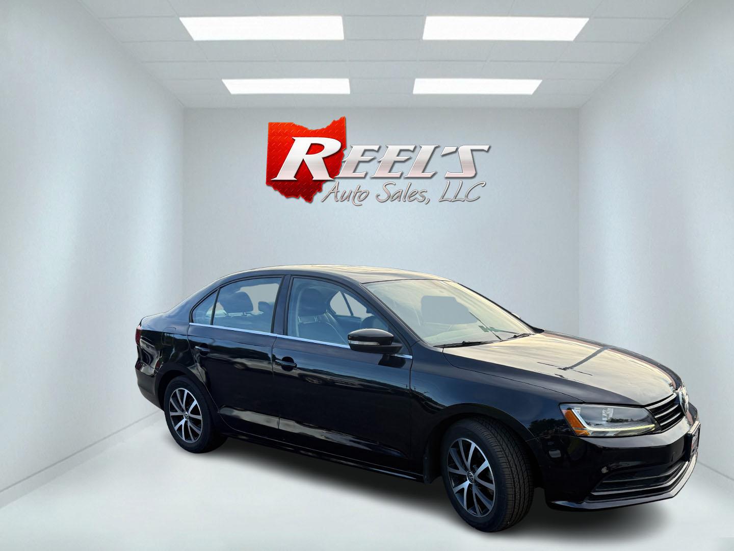 2017 Black /Black Volkswagen Jetta 1.4T SE 6A (3VWDB7AJXHM) with an 1.4L I4 DOHC 20V Turbo engine, Automatic transmission, located at 547 E. Main St., Orwell, OH, 44076, (440) 437-5893, 41.535435, -80.847855 - 2017 Volkswagen Jetta SE – Efficient German Sedan Comfort with Everyday Convenience If you want a compact sedan that feels a little more refined than a basic commuter car, this 2017 Volkswagen Jetta SE is a strong option. The 1.4L Turbocharged engine and 6-speed automatic deliver smooth everyday- Photo#3