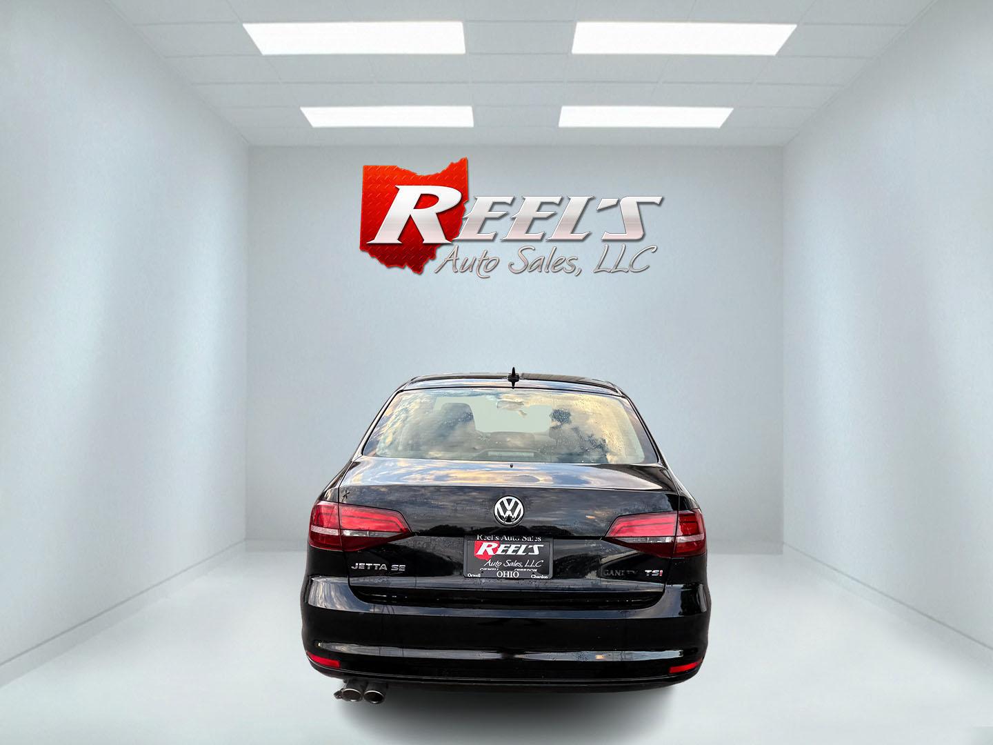 2017 Black /Black Volkswagen Jetta 1.4T SE 6A (3VWDB7AJXHM) with an 1.4L I4 DOHC 20V Turbo engine, Automatic transmission, located at 547 E. Main St., Orwell, OH, 44076, (440) 437-5893, 41.535435, -80.847855 - 2017 Volkswagen Jetta SE – Efficient German Sedan Comfort with Everyday Convenience If you want a compact sedan that feels a little more refined than a basic commuter car, this 2017 Volkswagen Jetta SE is a strong option. The 1.4L Turbocharged engine and 6-speed automatic deliver smooth everyday- Photo#29