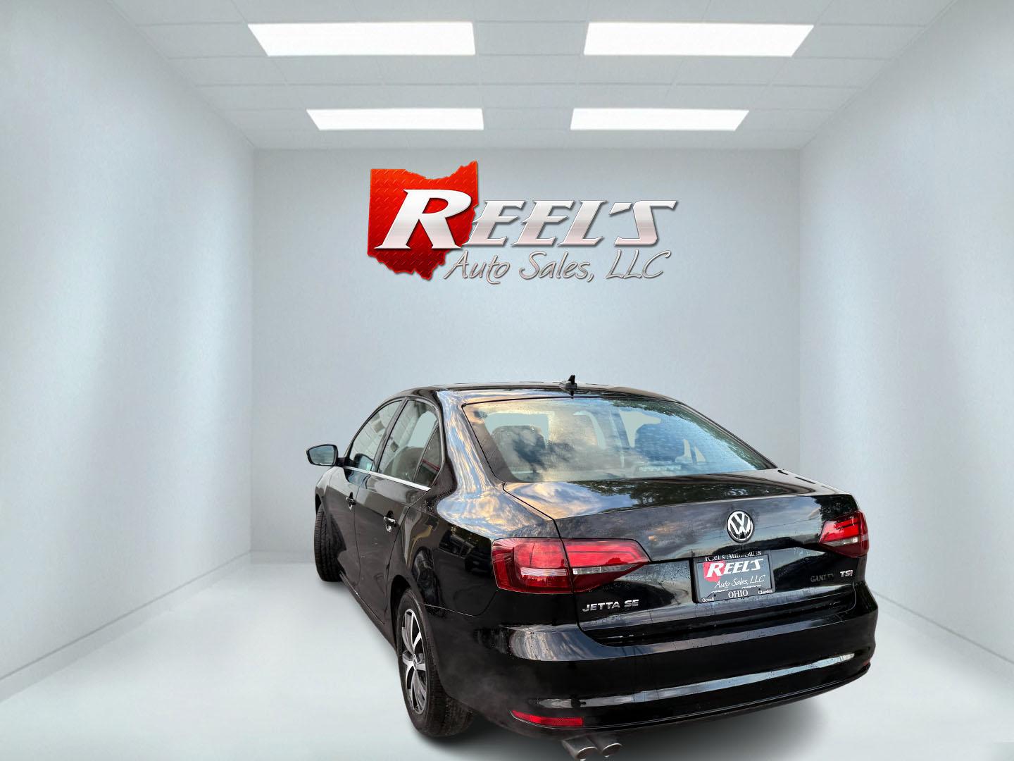 2017 Black /Black Volkswagen Jetta 1.4T SE 6A (3VWDB7AJXHM) with an 1.4L I4 DOHC 20V Turbo engine, Automatic transmission, located at 547 E. Main St., Orwell, OH, 44076, (440) 437-5893, 41.535435, -80.847855 - 2017 Volkswagen Jetta SE – Efficient German Sedan Comfort with Everyday Convenience If you want a compact sedan that feels a little more refined than a basic commuter car, this 2017 Volkswagen Jetta SE is a strong option. The 1.4L Turbocharged engine and 6-speed automatic deliver smooth everyday- Photo#30