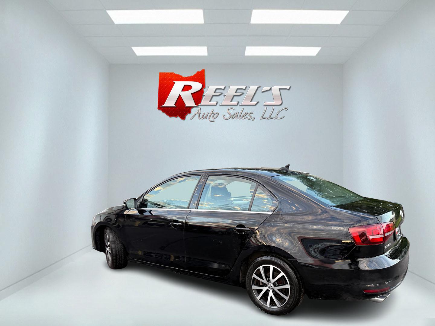 2017 Black /Black Volkswagen Jetta 1.4T SE 6A (3VWDB7AJXHM) with an 1.4L I4 DOHC 20V Turbo engine, Automatic transmission, located at 547 E. Main St., Orwell, OH, 44076, (440) 437-5893, 41.535435, -80.847855 - 2017 Volkswagen Jetta SE – Efficient German Sedan Comfort with Everyday Convenience If you want a compact sedan that feels a little more refined than a basic commuter car, this 2017 Volkswagen Jetta SE is a strong option. The 1.4L Turbocharged engine and 6-speed automatic deliver smooth everyday- Photo#31