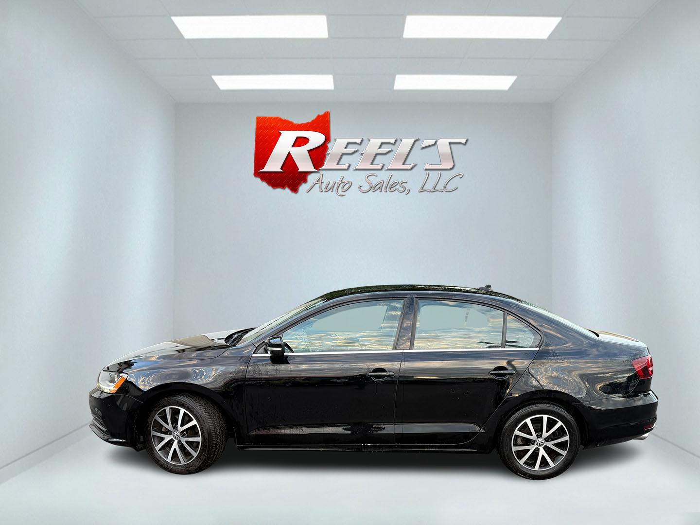 2017 Black /Black Volkswagen Jetta 1.4T SE 6A (3VWDB7AJXHM) with an 1.4L I4 DOHC 20V Turbo engine, Automatic transmission, located at 547 E. Main St., Orwell, OH, 44076, (440) 437-5893, 41.535435, -80.847855 - 2017 Volkswagen Jetta SE – Efficient German Sedan Comfort with Everyday Convenience If you want a compact sedan that feels a little more refined than a basic commuter car, this 2017 Volkswagen Jetta SE is a strong option. The 1.4L Turbocharged engine and 6-speed automatic deliver smooth everyday- Photo#33