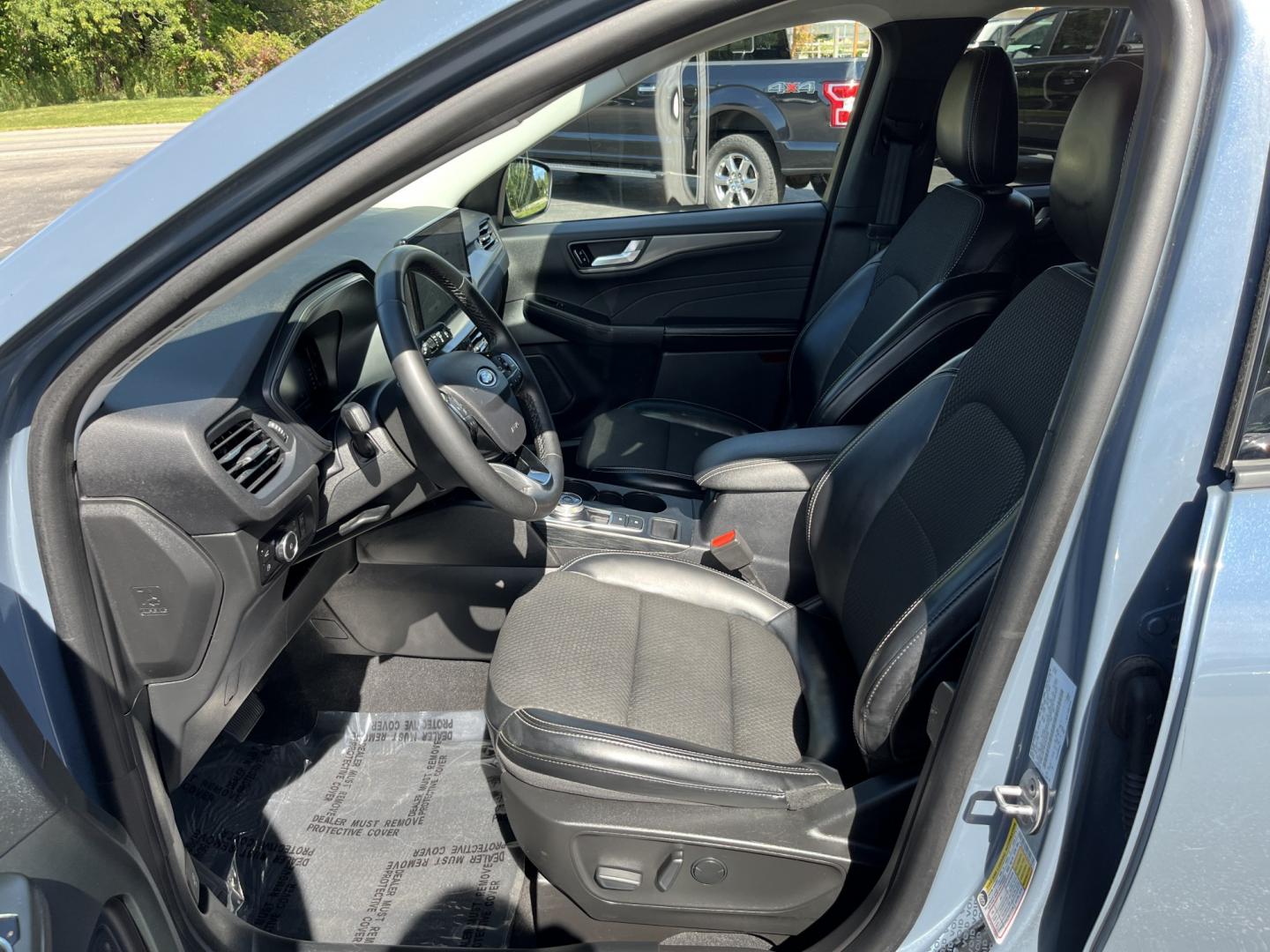 2023 Blue /Black Ford Escape Plug-in Hybrid SE (1FMCU0E19PU) with an 2.5L I4 DOHC 16V HYBRID engine, Automatic transmission, located at 11115 Chardon Rd. , Chardon, OH, 44024, (440) 214-9705, 41.580246, -81.241943 - 2023 Ford Escape Plug-In Hybrid – Efficient Family Crossover with Modern Tech and One-Owner History If you want a compact SUV that saves fuel without giving up everyday comfort, this 2023 Ford Escape Plug-In Hybrid is a strong option. The 2.5L hybrid system delivers a standout 40 MPG combined rat- Photo#18