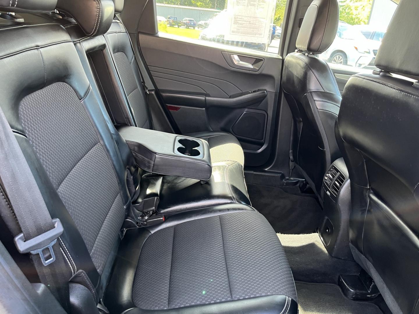 2023 Blue /Black Ford Escape Plug-in Hybrid SE (1FMCU0E19PU) with an 2.5L I4 DOHC 16V HYBRID engine, Automatic transmission, located at 11115 Chardon Rd. , Chardon, OH, 44024, (440) 214-9705, 41.580246, -81.241943 - 2023 Ford Escape Plug-In Hybrid – Efficient Family Crossover with Modern Tech and One-Owner History If you want a compact SUV that saves fuel without giving up everyday comfort, this 2023 Ford Escape Plug-In Hybrid is a strong option. The 2.5L hybrid system delivers a standout 40 MPG combined rat- Photo#32