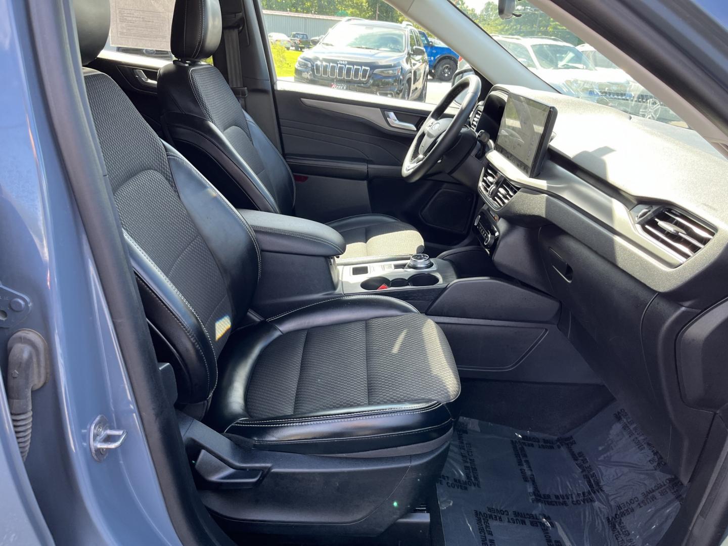 2023 Blue /Black Ford Escape Plug-in Hybrid SE (1FMCU0E19PU) with an 2.5L I4 DOHC 16V HYBRID engine, Automatic transmission, located at 11115 Chardon Rd. , Chardon, OH, 44024, (440) 214-9705, 41.580246, -81.241943 - 2023 Ford Escape Plug-In Hybrid – Efficient Family Crossover with Modern Tech and One-Owner History If you want a compact SUV that saves fuel without giving up everyday comfort, this 2023 Ford Escape Plug-In Hybrid is a strong option. The 2.5L hybrid system delivers a standout 40 MPG combined rat- Photo#34