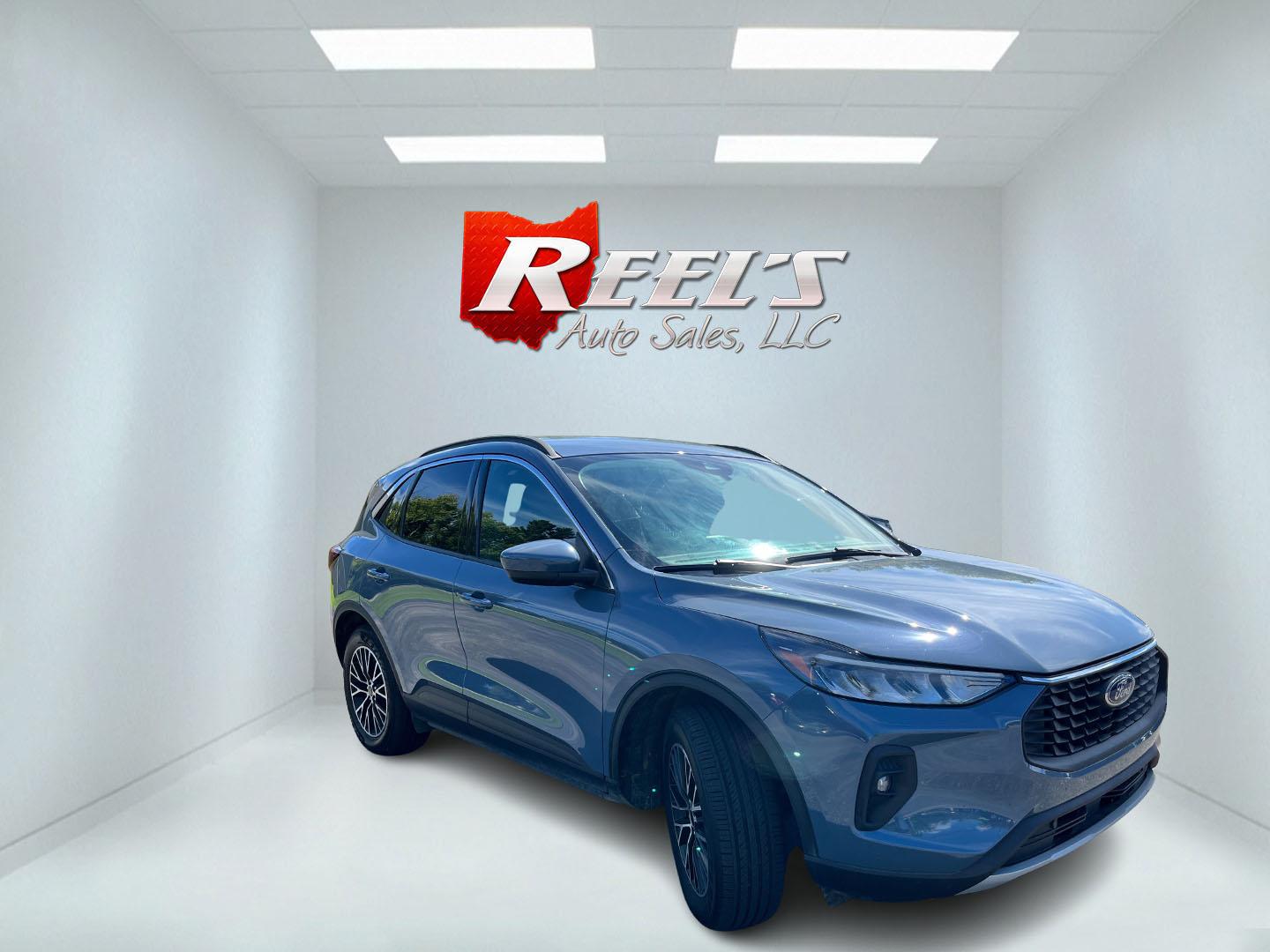 2023 Blue /Black Ford Escape Plug-in Hybrid SE (1FMCU0E19PU) with an 2.5L I4 DOHC 16V HYBRID engine, Automatic transmission, located at 11115 Chardon Rd. , Chardon, OH, 44024, (440) 214-9705, 41.580246, -81.241943 - 2023 Ford Escape Plug-In Hybrid – Efficient Family Crossover with Modern Tech and One-Owner History If you want a compact SUV that saves fuel without giving up everyday comfort, this 2023 Ford Escape Plug-In Hybrid is a strong option. The 2.5L hybrid system delivers a standout 40 MPG combined rat- Photo#2