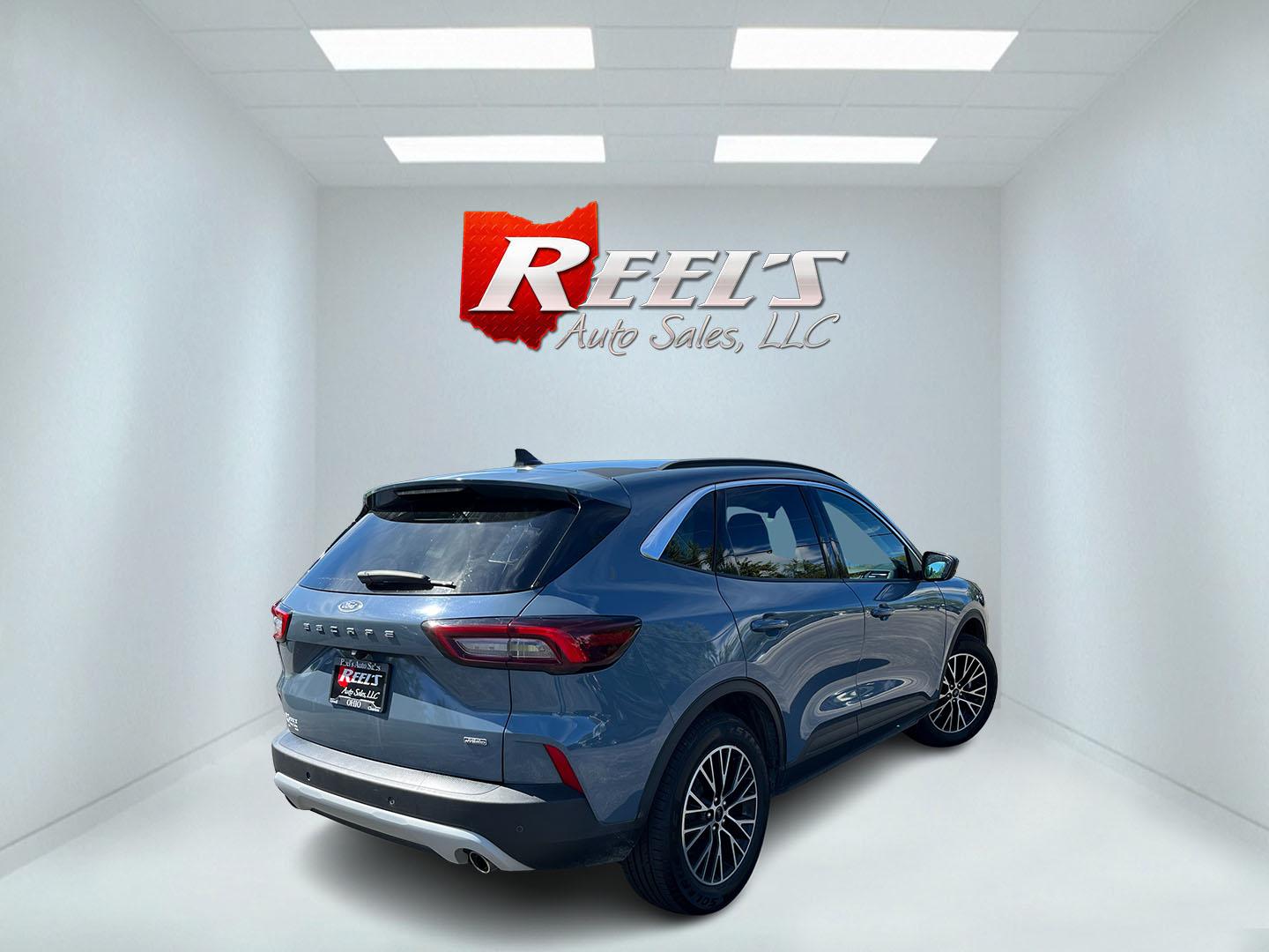 2023 Blue /Black Ford Escape Plug-in Hybrid SE (1FMCU0E19PU) with an 2.5L I4 DOHC 16V HYBRID engine, Automatic transmission, located at 11115 Chardon Rd. , Chardon, OH, 44024, (440) 214-9705, 41.580246, -81.241943 - 2023 Ford Escape Plug-In Hybrid – Efficient Family Crossover with Modern Tech and One-Owner History If you want a compact SUV that saves fuel without giving up everyday comfort, this 2023 Ford Escape Plug-In Hybrid is a strong option. The 2.5L hybrid system delivers a standout 40 MPG combined rat- Photo#6