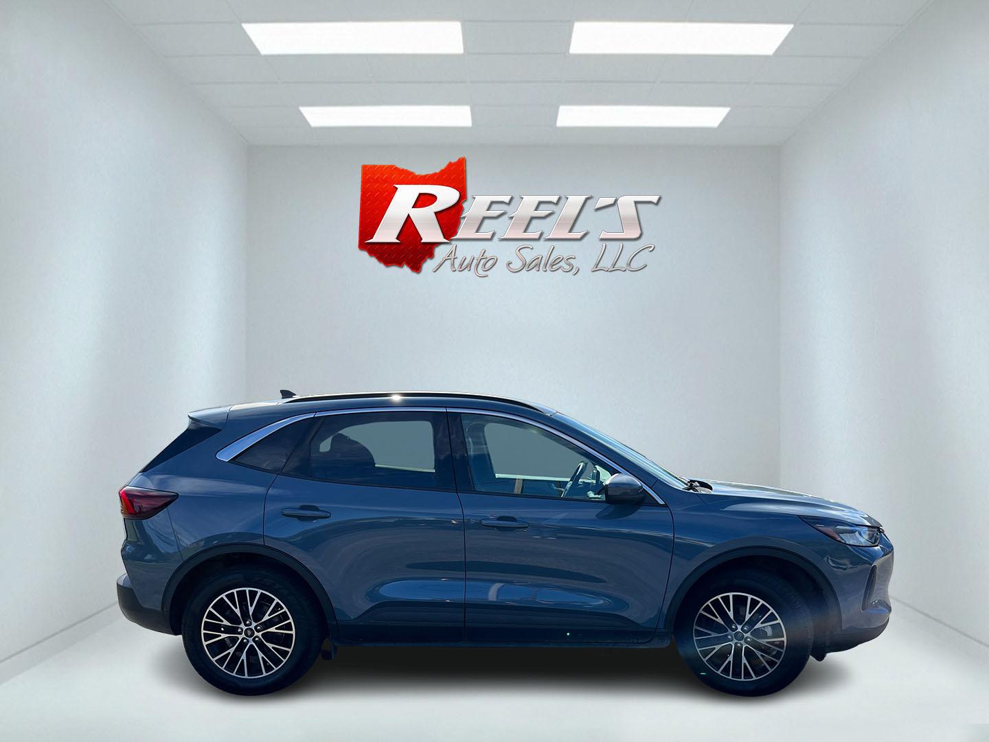 2023 Blue /Black Ford Escape Plug-in Hybrid SE (1FMCU0E19PU) with an 2.5L I4 DOHC 16V HYBRID engine, Automatic transmission, located at 11115 Chardon Rd. , Chardon, OH, 44024, (440) 214-9705, 41.580246, -81.241943 - 2023 Ford Escape Plug-In Hybrid – Efficient Family Crossover with Modern Tech and One-Owner History If you want a compact SUV that saves fuel without giving up everyday comfort, this 2023 Ford Escape Plug-In Hybrid is a strong option. The 2.5L hybrid system delivers a standout 40 MPG combined rat- Photo#5
