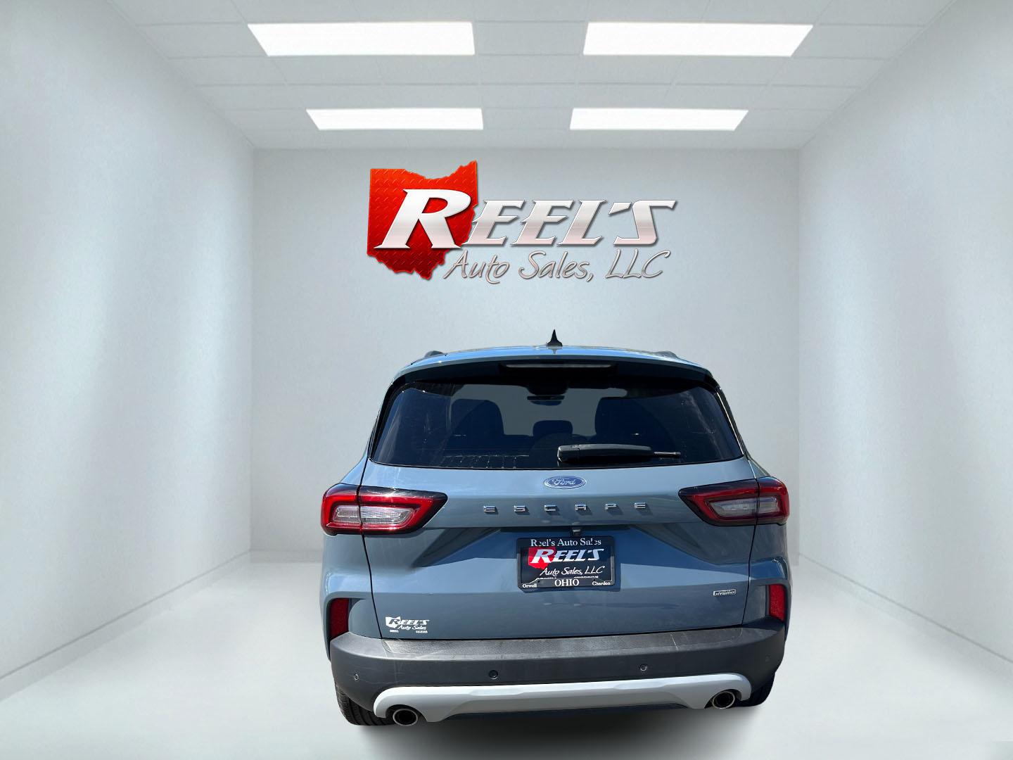 2023 Blue /Black Ford Escape Plug-in Hybrid SE (1FMCU0E19PU) with an 2.5L I4 DOHC 16V HYBRID engine, Automatic transmission, located at 11115 Chardon Rd. , Chardon, OH, 44024, (440) 214-9705, 41.580246, -81.241943 - 2023 Ford Escape Plug-In Hybrid – Efficient Family Crossover with Modern Tech and One-Owner History If you want a compact SUV that saves fuel without giving up everyday comfort, this 2023 Ford Escape Plug-In Hybrid is a strong option. The 2.5L hybrid system delivers a standout 40 MPG combined rat- Photo#8
