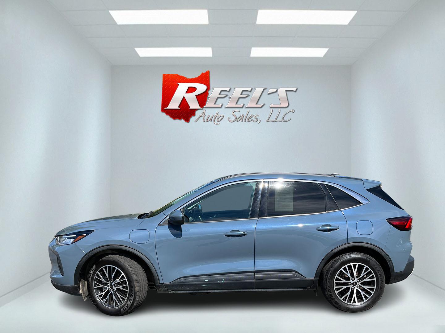 2023 Blue /Black Ford Escape Plug-in Hybrid SE (1FMCU0E19PU) with an 2.5L I4 DOHC 16V HYBRID engine, Automatic transmission, located at 11115 Chardon Rd. , Chardon, OH, 44024, (440) 214-9705, 41.580246, -81.241943 - 2023 Ford Escape Plug-In Hybrid – Efficient Family Crossover with Modern Tech and One-Owner History If you want a compact SUV that saves fuel without giving up everyday comfort, this 2023 Ford Escape Plug-In Hybrid is a strong option. The 2.5L hybrid system delivers a standout 40 MPG combined rat- Photo#11