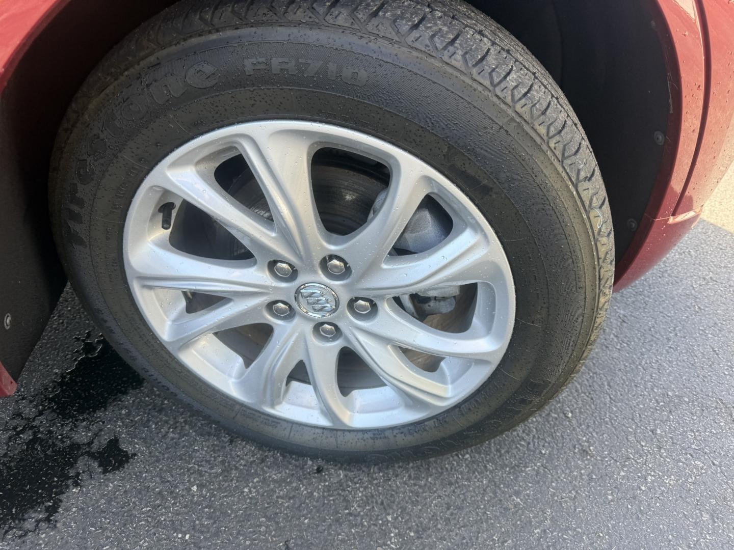 2019 Red /Beige Buick Envision Preferred AWD (LRBFX1SA7KD) with an 2.5L I4 DOHC 24V engine, Automatic transmission, located at 547 E. Main St., Orwell, OH, 44076, (440) 437-5893, 41.535435, -80.847855 - 2019 Buick Envision Preferred AWD – Refined Compact SUV Comfort with Everyday Convenience The Envision is Buick’s more upscale compact SUV, and this 2019 Preferred AWD is a practical way into that quieter, more polished feel. Finished in Agate Red Metallic, with LED daytime running lights and d- Photo#4