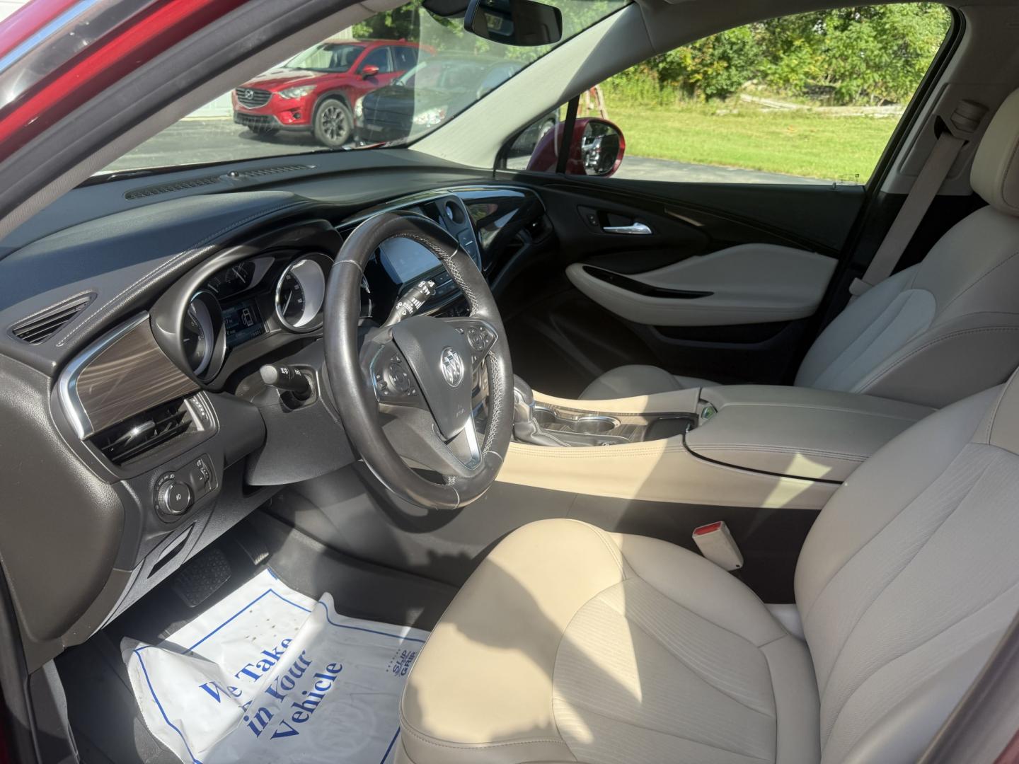 2019 Red /Beige Buick Envision Preferred AWD (LRBFX1SA7KD) with an 2.5L I4 DOHC 24V engine, Automatic transmission, located at 547 E. Main St., Orwell, OH, 44076, (440) 437-5893, 41.535435, -80.847855 - 2019 Buick Envision Preferred AWD – Refined Compact SUV Comfort with Everyday Convenience The Envision is Buick’s more upscale compact SUV, and this 2019 Preferred AWD is a practical way into that quieter, more polished feel. Finished in Agate Red Metallic, with LED daytime running lights and d- Photo#6