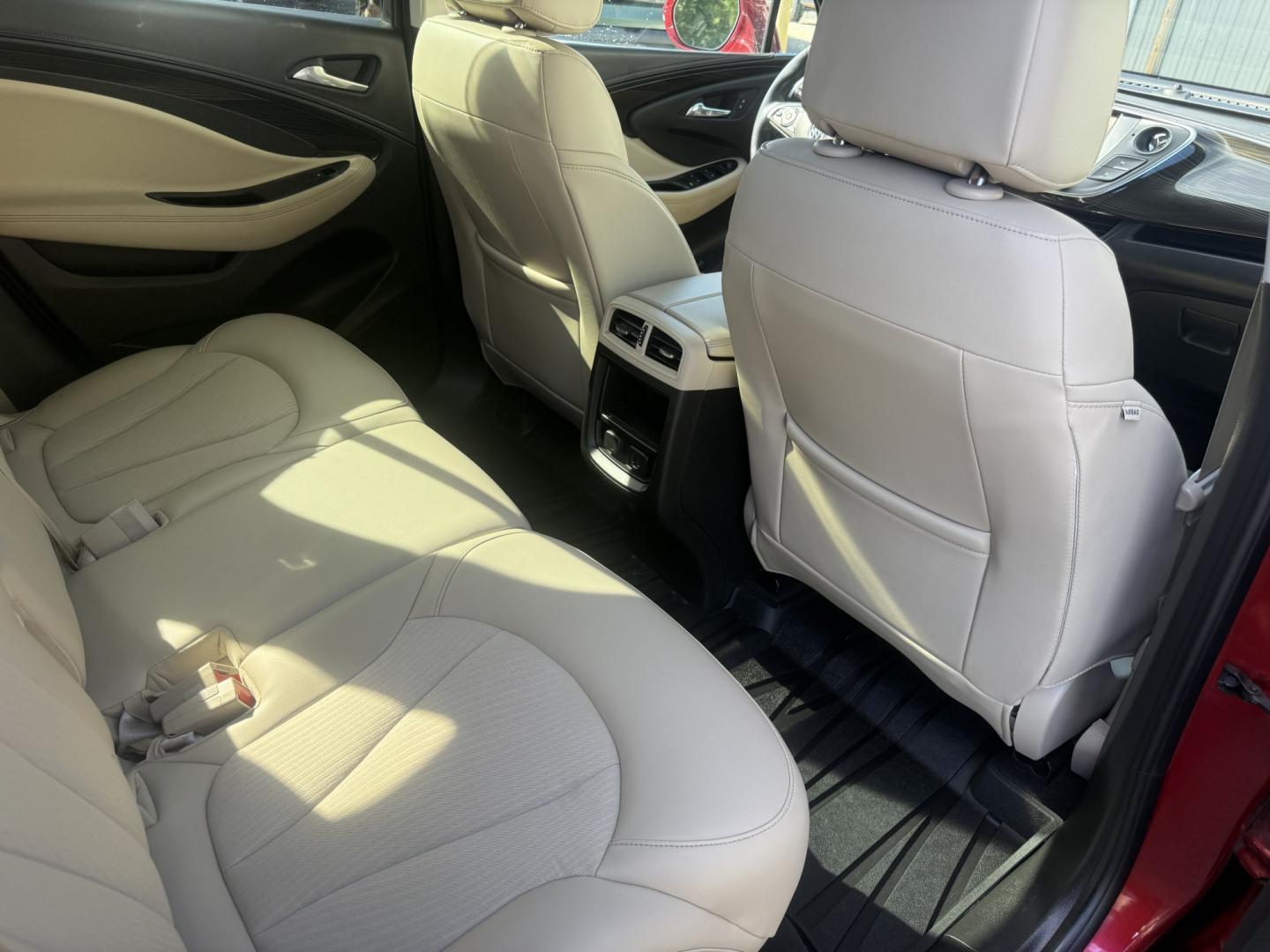 2019 Red /Beige Buick Envision Preferred AWD (LRBFX1SA7KD) with an 2.5L I4 DOHC 24V engine, Automatic transmission, located at 547 E. Main St., Orwell, OH, 44076, (440) 437-5893, 41.535435, -80.847855 - 2019 Buick Envision Preferred AWD – Refined Compact SUV Comfort with Everyday Convenience The Envision is Buick’s more upscale compact SUV, and this 2019 Preferred AWD is a practical way into that quieter, more polished feel. Finished in Agate Red Metallic, with LED daytime running lights and d- Photo#40