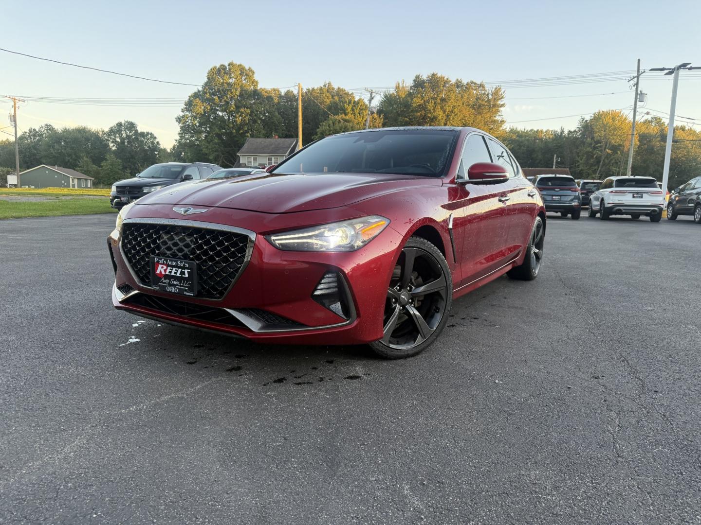 2019 Red /Black Genesis G70 Advance AWD (KMTG44LA2KU) with an 2.0L I4 DOHC 16V Turbo engine, Automatic transmission, located at 547 E. Main St., Orwell, OH, 44076, (440) 437-5893, 41.535435, -80.847855 - 2019 Genesis G70 Advance AWD – The Sedan That Makes the Drive Feel Like the Point Some cars get you there. This one makes you look forward to the trip. The 2019 Genesis G70 Advance AWD was built to go after the German sport sedans, and it has the presence to match. Finished in Havana Red on 19" g- Photo#0
