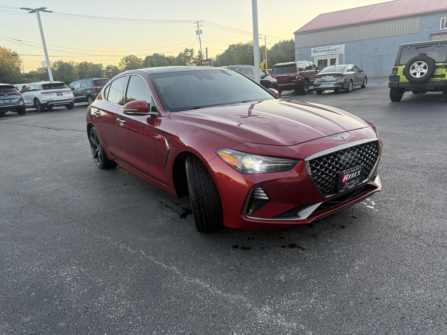 2019 Red /Black Genesis G70 Advance AWD (KMTG44LA2KU) with an 2.0L I4 DOHC 16V Turbo engine, Automatic transmission, located at 547 E. Main St., Orwell, OH, 44076, (440) 437-5893, 41.535435, -80.847855 - 2019 Genesis G70 Advance AWD – The Sedan That Makes the Drive Feel Like the Point Some cars get you there. This one makes you look forward to the trip. The 2019 Genesis G70 Advance AWD was built to go after the German sport sedans, and it has the presence to match. Finished in Havana Red on 19" g- Photo#2