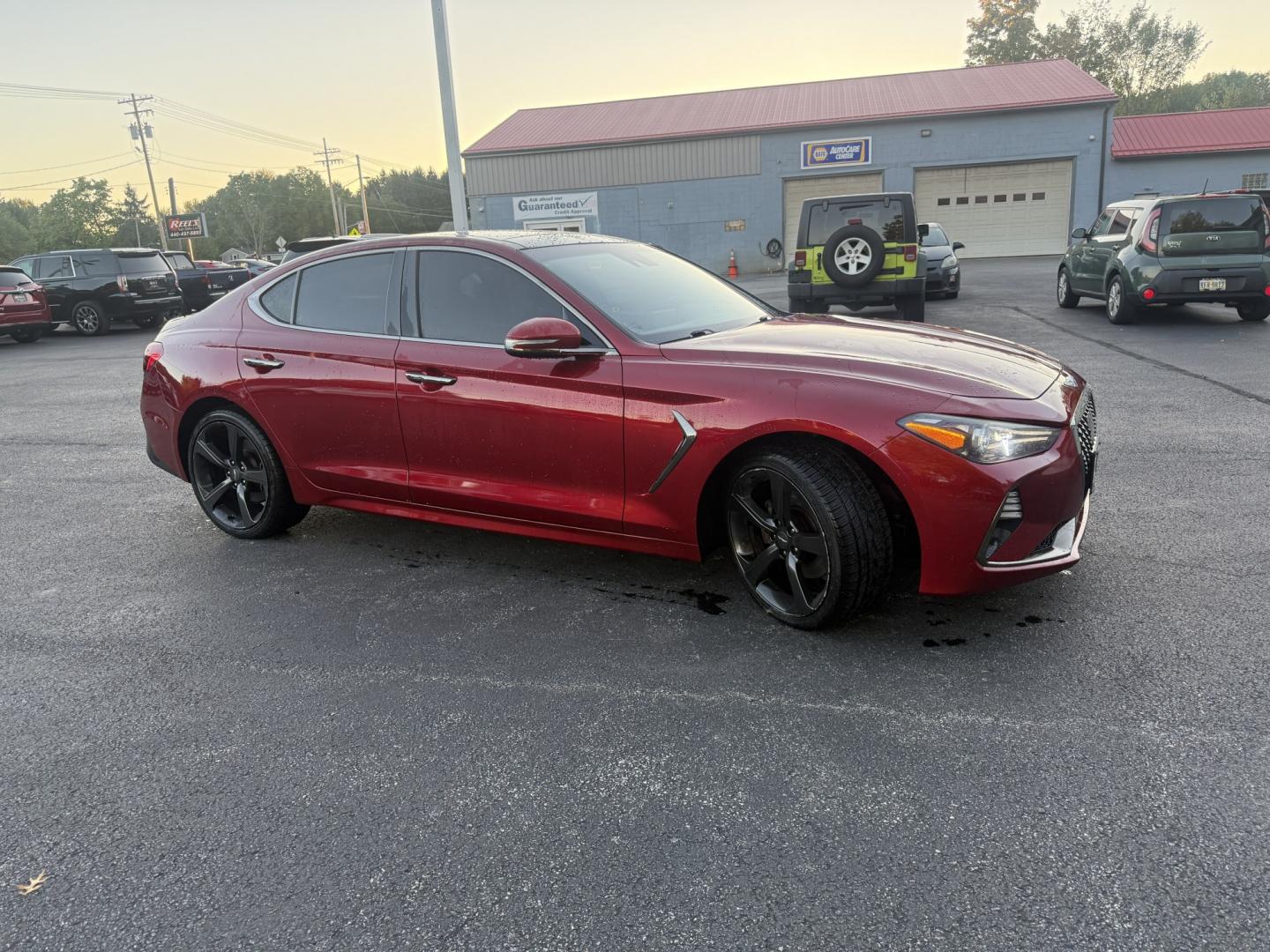 2019 Red /Black Genesis G70 Advance AWD (KMTG44LA2KU) with an 2.0L I4 DOHC 16V Turbo engine, Automatic transmission, located at 547 E. Main St., Orwell, OH, 44076, (440) 437-5893, 41.535435, -80.847855 - 2019 Genesis G70 Advance AWD – The Sedan That Makes the Drive Feel Like the Point Some cars get you there. This one makes you look forward to the trip. The 2019 Genesis G70 Advance AWD was built to go after the German sport sedans, and it has the presence to match. Finished in Havana Red on 19" g- Photo#3