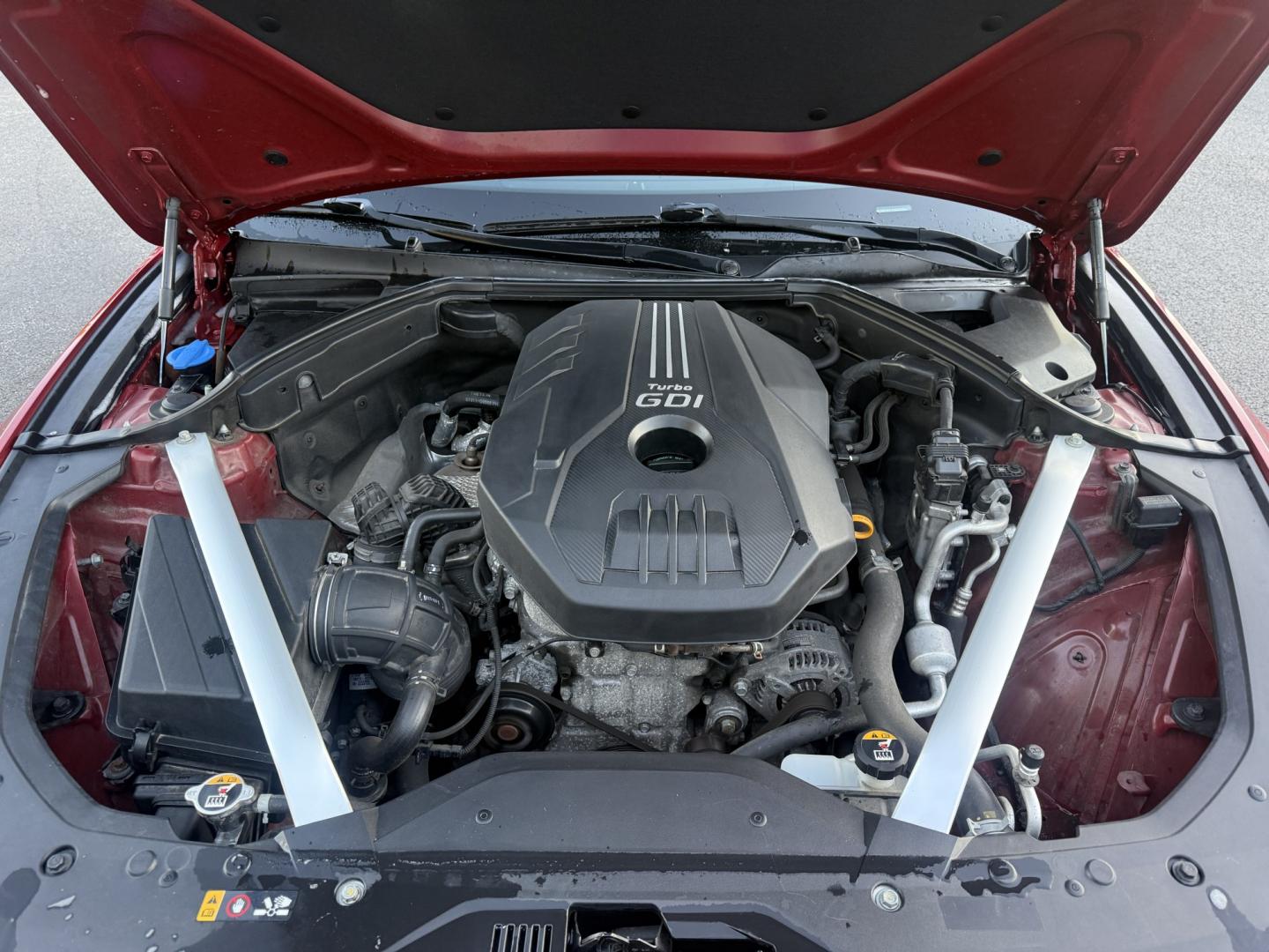 2019 Red /Black Genesis G70 Advance AWD (KMTG44LA2KU) with an 2.0L I4 DOHC 16V Turbo engine, Automatic transmission, located at 547 E. Main St., Orwell, OH, 44076, (440) 437-5893, 41.535435, -80.847855 - 2019 Genesis G70 Advance AWD – The Sedan That Makes the Drive Feel Like the Point Some cars get you there. This one makes you look forward to the trip. The 2019 Genesis G70 Advance AWD was built to go after the German sport sedans, and it has the presence to match. Finished in Havana Red on 19" g- Photo#6