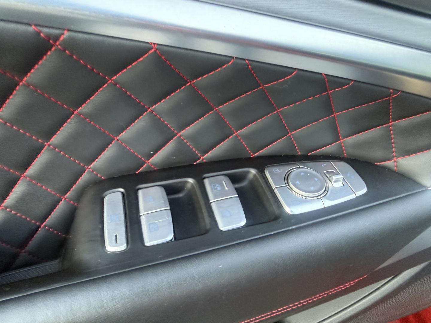 2019 Red /Black Genesis G70 Advance AWD (KMTG44LA2KU) with an 2.0L I4 DOHC 16V Turbo engine, Automatic transmission, located at 547 E. Main St., Orwell, OH, 44076, (440) 437-5893, 41.535435, -80.847855 - 2019 Genesis G70 Advance AWD – The Sedan That Makes the Drive Feel Like the Point Some cars get you there. This one makes you look forward to the trip. The 2019 Genesis G70 Advance AWD was built to go after the German sport sedans, and it has the presence to match. Finished in Havana Red on 19" g- Photo#9