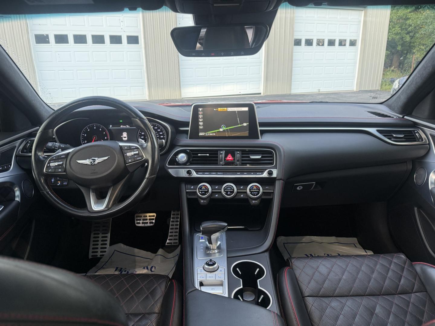 2019 Red /Black Genesis G70 Advance AWD (KMTG44LA2KU) with an 2.0L I4 DOHC 16V Turbo engine, Automatic transmission, located at 547 E. Main St., Orwell, OH, 44076, (440) 437-5893, 41.535435, -80.847855 - 2019 Genesis G70 Advance AWD – The Sedan That Makes the Drive Feel Like the Point Some cars get you there. This one makes you look forward to the trip. The 2019 Genesis G70 Advance AWD was built to go after the German sport sedans, and it has the presence to match. Finished in Havana Red on 19" g- Photo#28