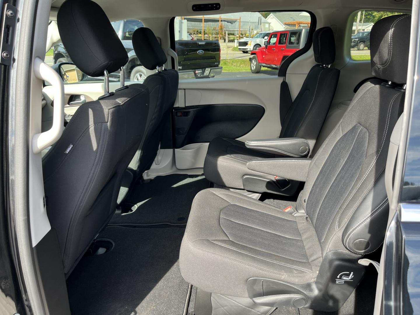 2023 Black /Black Chrysler Voyager LX (2C4RC1CG3PR) with an 3.6L V6 DOHC 24V engine, Automatic transmission, located at 11115 Chardon Rd. , Chardon, OH, 44024, (440) 214-9705, 41.580246, -81.241943 - 2023 Chrysler Voyager LX – Family-Ready Minivan with Room, Comfort, and One-Owner History If you need a van that makes family life easier, this 2023 Chrysler Voyager LX is built for that. There is room for the kids, the gear, and the longer drives that come with a full household. The 3.6L Pentast- Photo#30