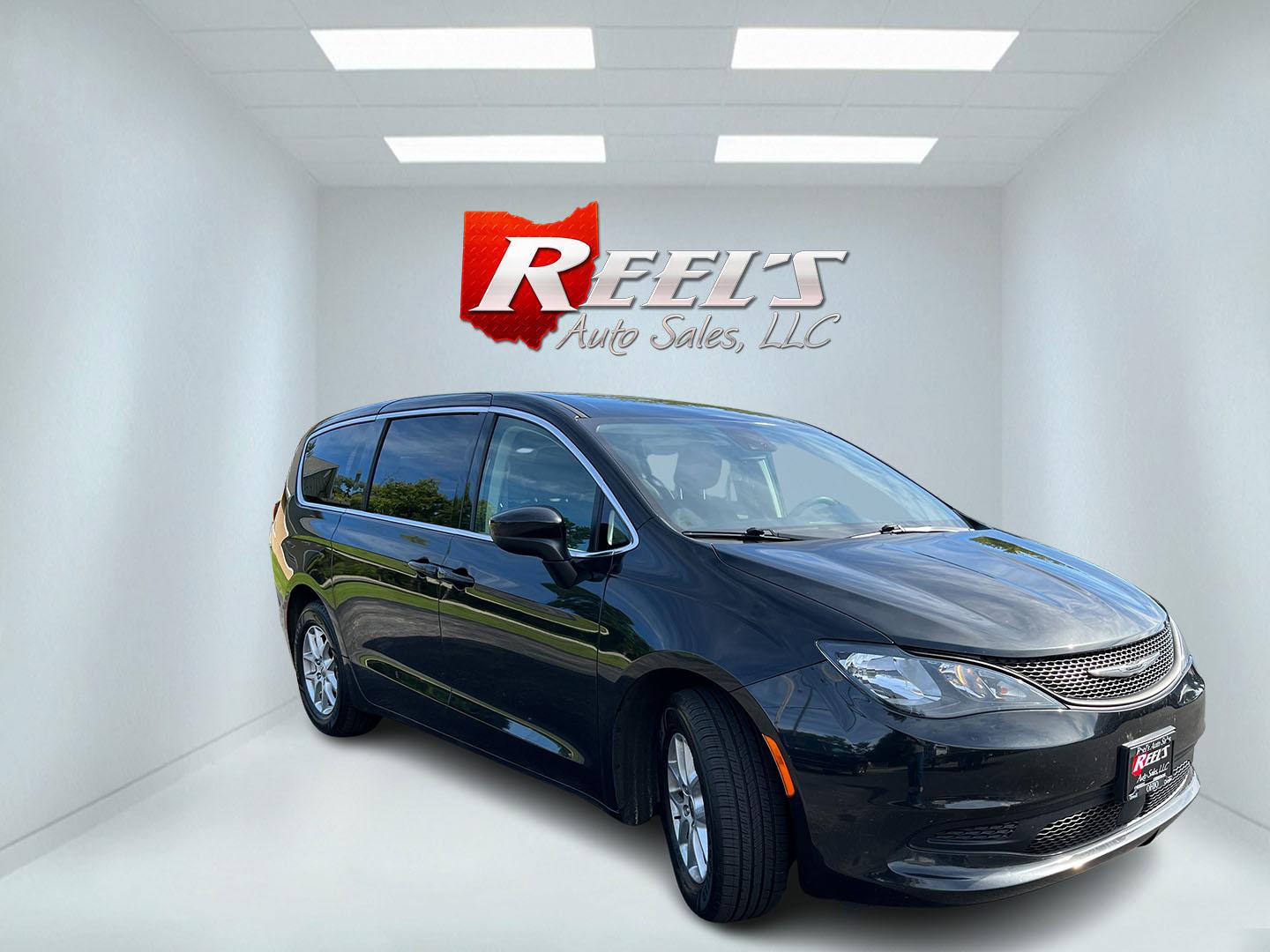 2023 Black /Black Chrysler Voyager LX (2C4RC1CG3PR) with an 3.6L V6 DOHC 24V engine, Automatic transmission, located at 11115 Chardon Rd. , Chardon, OH, 44024, (440) 214-9705, 41.580246, -81.241943 - 2023 Chrysler Voyager LX – Family-Ready Minivan with Room, Comfort, and One-Owner History If you need a van that makes family life easier, this 2023 Chrysler Voyager LX is built for that. There is room for the kids, the gear, and the longer drives that come with a full household. The 3.6L Pentast- Photo#2
