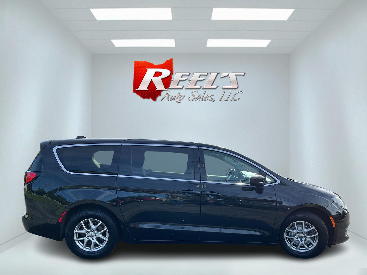 2023 Black /Black Chrysler Voyager LX (2C4RC1CG3PR) with an 3.6L V6 DOHC 24V engine, Automatic transmission, located at 11115 Chardon Rd. , Chardon, OH, 44024, (440) 214-9705, 41.580246, -81.241943 - 2023 Chrysler Voyager LX – Family-Ready Minivan with Room, Comfort, and One-Owner History If you need a van that makes family life easier, this 2023 Chrysler Voyager LX is built for that. There is room for the kids, the gear, and the longer drives that come with a full household. The 3.6L Pentast- Photo#5