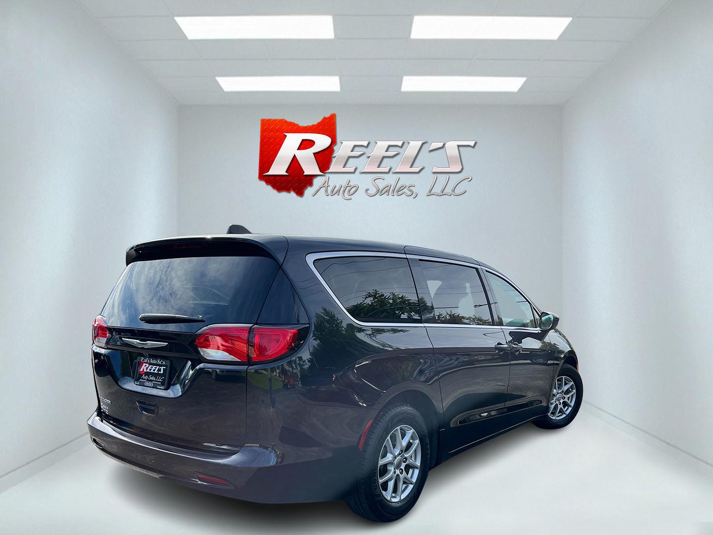 2023 Black /Black Chrysler Voyager LX (2C4RC1CG3PR) with an 3.6L V6 DOHC 24V engine, Automatic transmission, located at 11115 Chardon Rd. , Chardon, OH, 44024, (440) 214-9705, 41.580246, -81.241943 - 2023 Chrysler Voyager LX – Family-Ready Minivan with Room, Comfort, and One-Owner History If you need a van that makes family life easier, this 2023 Chrysler Voyager LX is built for that. There is room for the kids, the gear, and the longer drives that come with a full household. The 3.6L Pentast- Photo#6