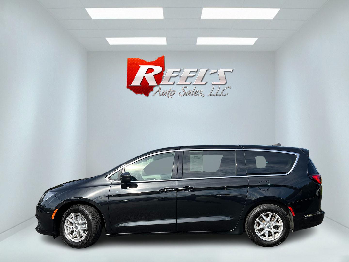 2023 Black /Black Chrysler Voyager LX (2C4RC1CG3PR) with an 3.6L V6 DOHC 24V engine, Automatic transmission, located at 11115 Chardon Rd. , Chardon, OH, 44024, (440) 214-9705, 41.580246, -81.241943 - 2023 Chrysler Voyager LX – Family-Ready Minivan with Room, Comfort, and One-Owner History If you need a van that makes family life easier, this 2023 Chrysler Voyager LX is built for that. There is room for the kids, the gear, and the longer drives that come with a full household. The 3.6L Pentast- Photo#11
