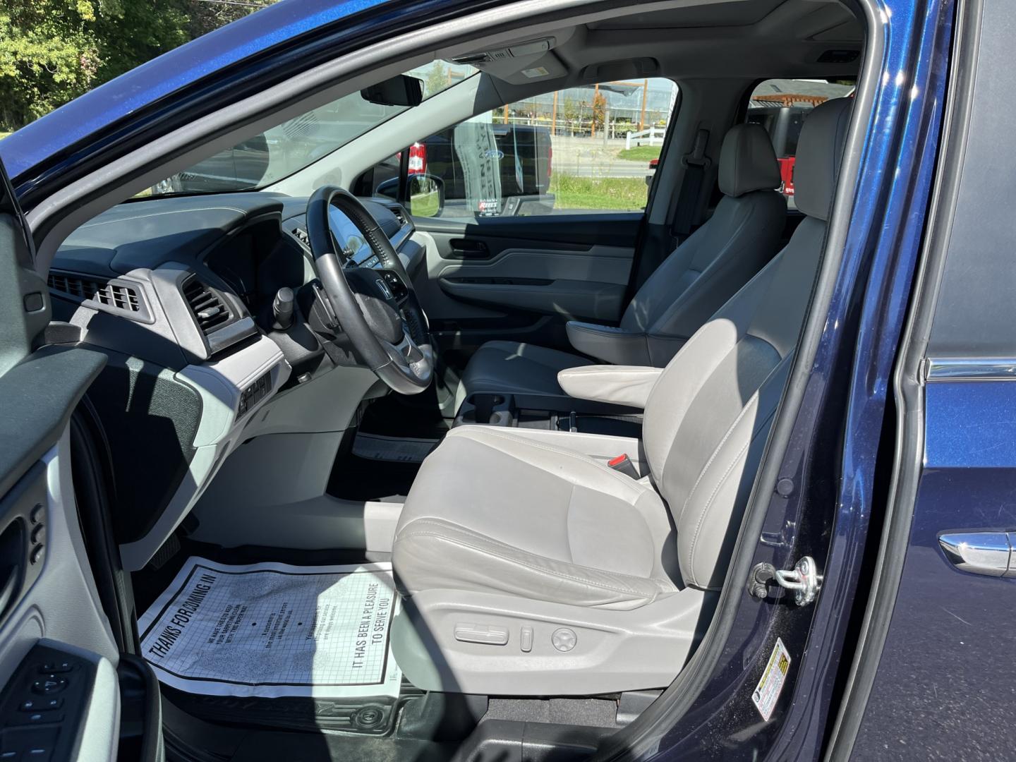 2019 Blue /Gray Honda Odyssey EX-L NAV RES (5FNRL6H71KB) with an 3.5L V6 SOHC 24V engine, Automatic transmission, located at 11115 Chardon Rd. , Chardon, OH, 44024, (440) 214-9705, 41.580246, -81.241943 - 2019 Honda Odyssey EX-L with Navigation and Rear Entertainment – Family Luxury That Makes the Miles Easier If you want a minivan that feels a step above and still handles real family life, this 2019 Honda Odyssey EX-L is a strong choice. Honda’s reputation for reliability meets a cabin built ar- Photo#19