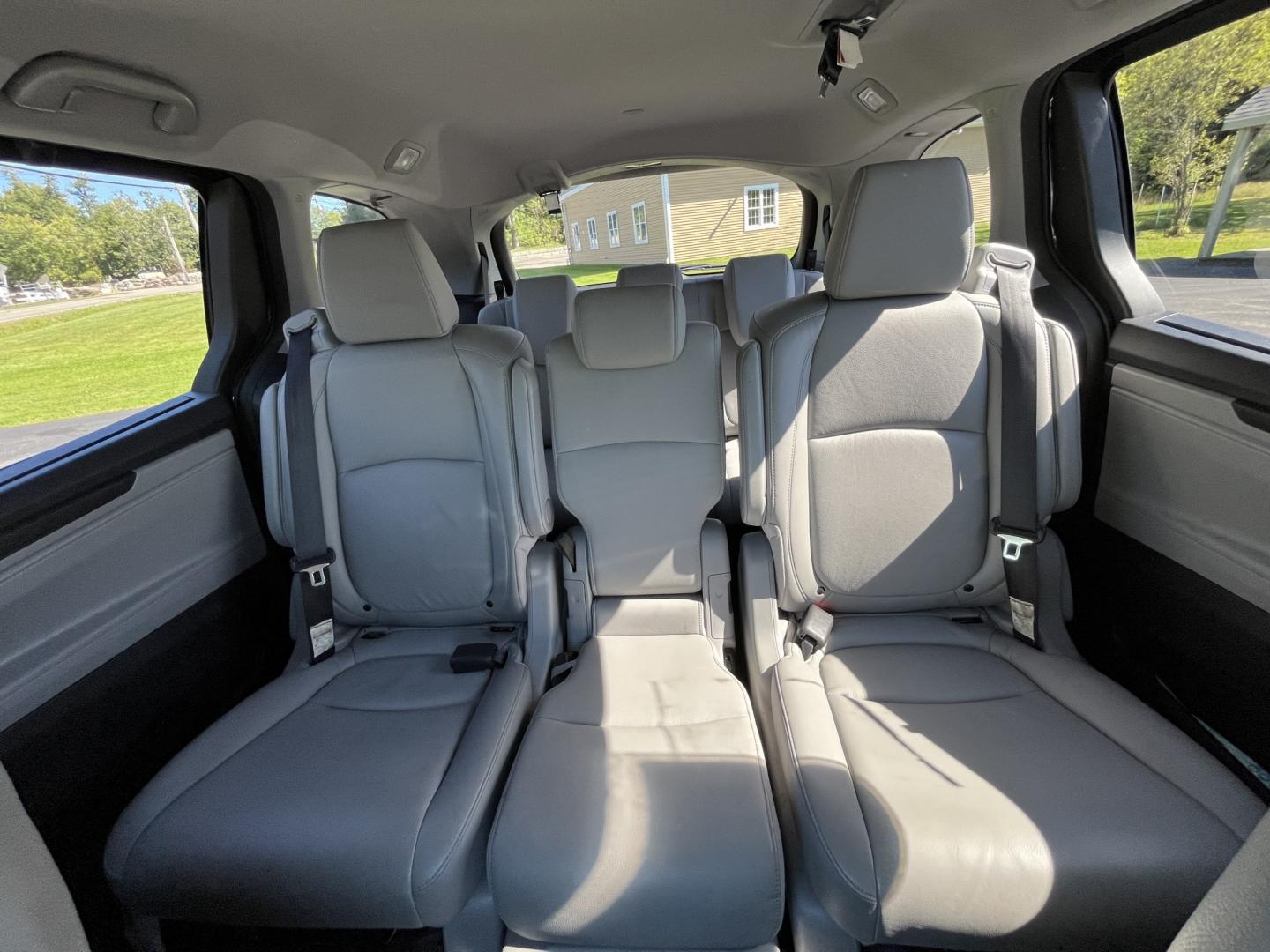 2019 Blue /Gray Honda Odyssey EX-L NAV RES (5FNRL6H71KB) with an 3.5L V6 SOHC 24V engine, Automatic transmission, located at 11115 Chardon Rd. , Chardon, OH, 44024, (440) 214-9705, 41.580246, -81.241943 - 2019 Honda Odyssey EX-L with Navigation and Rear Entertainment – Family Luxury That Makes the Miles Easier If you want a minivan that feels a step above and still handles real family life, this 2019 Honda Odyssey EX-L is a strong choice. Honda’s reputation for reliability meets a cabin built ar- Photo#30
