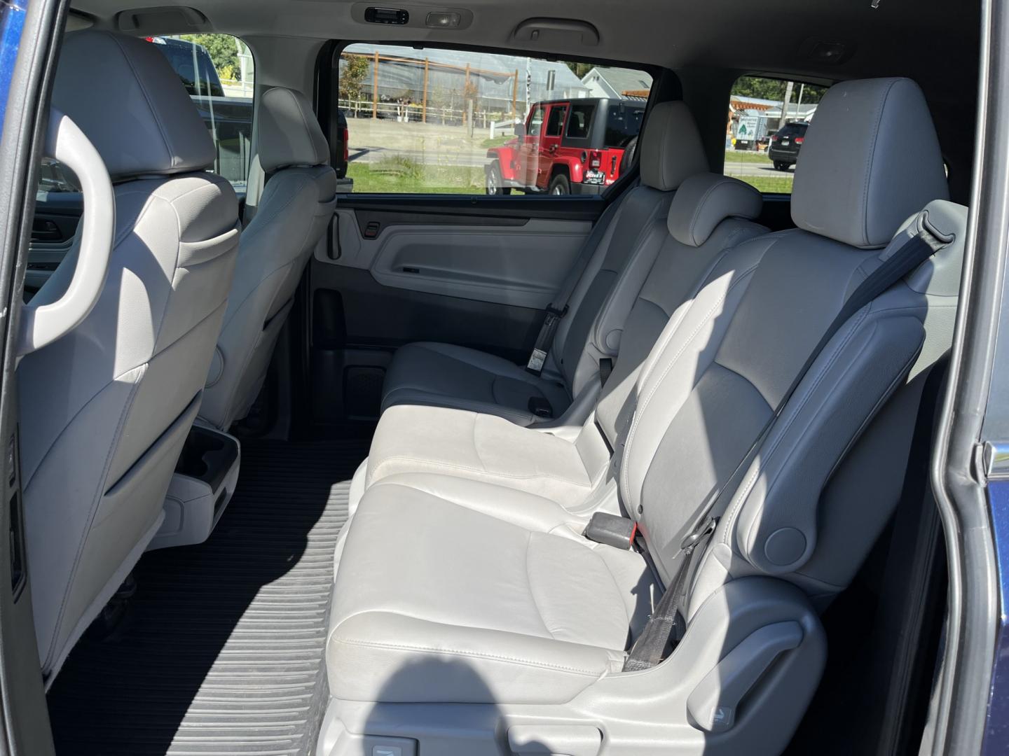 2019 Blue /Gray Honda Odyssey EX-L NAV RES (5FNRL6H71KB) with an 3.5L V6 SOHC 24V engine, Automatic transmission, located at 11115 Chardon Rd. , Chardon, OH, 44024, (440) 214-9705, 41.580246, -81.241943 - 2019 Honda Odyssey EX-L with Navigation and Rear Entertainment – Family Luxury That Makes the Miles Easier If you want a minivan that feels a step above and still handles real family life, this 2019 Honda Odyssey EX-L is a strong choice. Honda’s reputation for reliability meets a cabin built ar- Photo#33