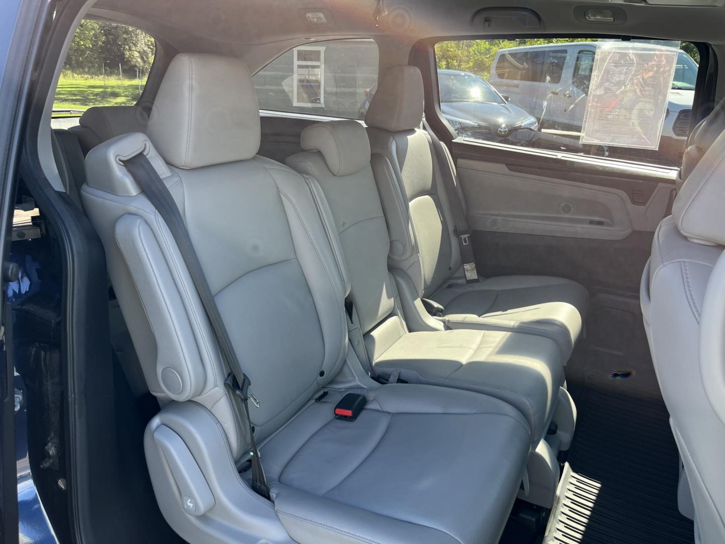 2019 Blue /Gray Honda Odyssey EX-L NAV RES (5FNRL6H71KB) with an 3.5L V6 SOHC 24V engine, Automatic transmission, located at 11115 Chardon Rd. , Chardon, OH, 44024, (440) 214-9705, 41.580246, -81.241943 - 2019 Honda Odyssey EX-L with Navigation and Rear Entertainment – Family Luxury That Makes the Miles Easier If you want a minivan that feels a step above and still handles real family life, this 2019 Honda Odyssey EX-L is a strong choice. Honda’s reputation for reliability meets a cabin built ar- Photo#39