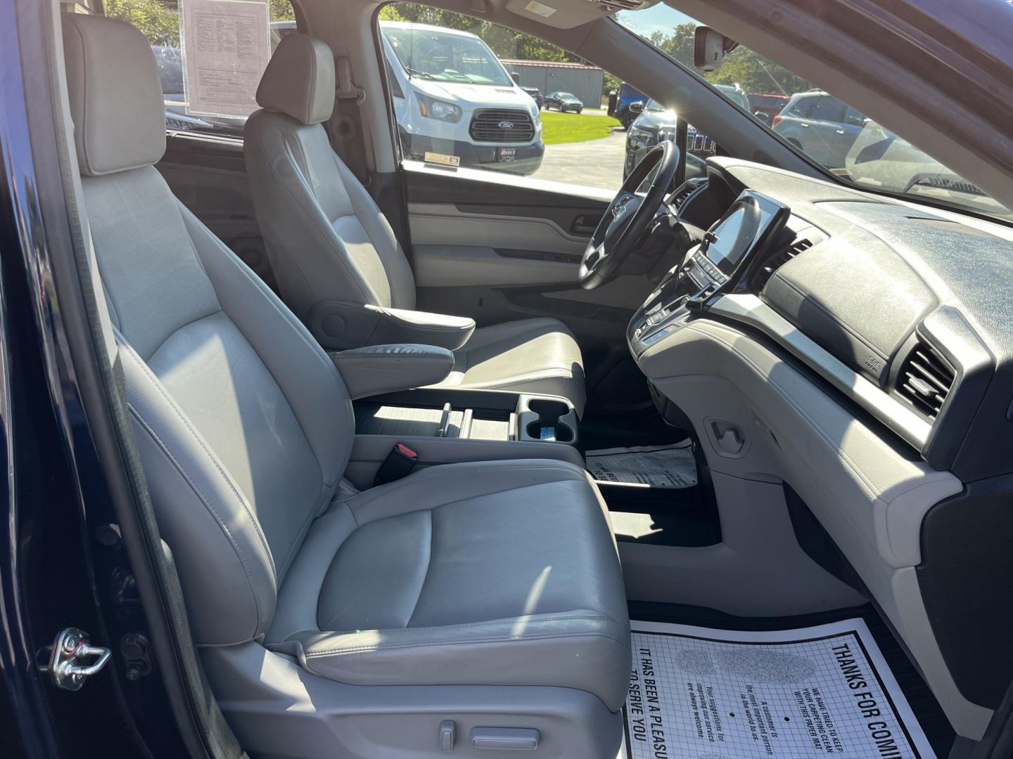 2019 Blue /Gray Honda Odyssey EX-L NAV RES (5FNRL6H71KB) with an 3.5L V6 SOHC 24V engine, Automatic transmission, located at 11115 Chardon Rd. , Chardon, OH, 44024, (440) 214-9705, 41.580246, -81.241943 - 2019 Honda Odyssey EX-L with Navigation and Rear Entertainment – Family Luxury That Makes the Miles Easier If you want a minivan that feels a step above and still handles real family life, this 2019 Honda Odyssey EX-L is a strong choice. Honda’s reputation for reliability meets a cabin built ar- Photo#41