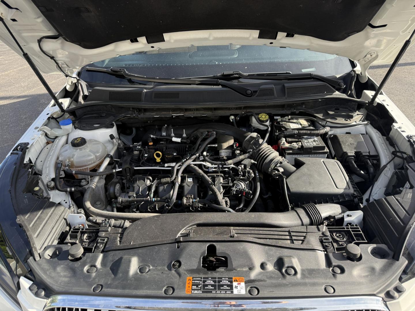 2021 White /Brown Lincoln Corsair Reserve AWD (5LMCJ2D98MU) with an 2.0L I4 DOHC 16V Turbo engine, Automatic transmission, located at 547 E. Main St., Orwell, OH, 44076, (440) 437-5893, 41.535435, -80.847855 - 2021 Lincoln Corsair Reserve AWD – Quiet Luxury in a Smaller, More Exclusive Package Lincoln is not a volume brand, and this 2021 Corsair Reserve AWD feels like it. Finished in Pristine White on 19" aluminum wheels, with full LED exterior lighting, it has the clean, composed presence of a luxury- Photo#5