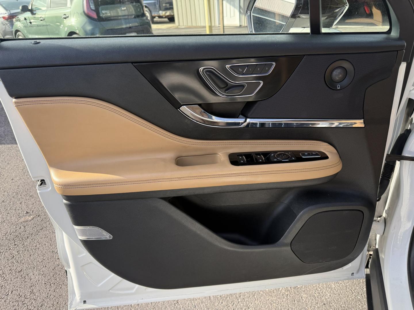 2021 White /Brown Lincoln Corsair Reserve AWD (5LMCJ2D98MU) with an 2.0L I4 DOHC 16V Turbo engine, Automatic transmission, located at 547 E. Main St., Orwell, OH, 44076, (440) 437-5893, 41.535435, -80.847855 - 2021 Lincoln Corsair Reserve AWD – Quiet Luxury in a Smaller, More Exclusive Package Lincoln is not a volume brand, and this 2021 Corsair Reserve AWD feels like it. Finished in Pristine White on 19" aluminum wheels, with full LED exterior lighting, it has the clean, composed presence of a luxury- Photo#8