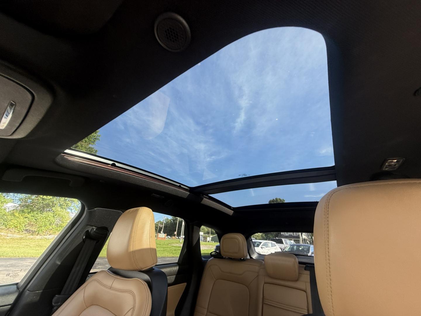 2021 White /Brown Lincoln Corsair Reserve AWD (5LMCJ2D98MU) with an 2.0L I4 DOHC 16V Turbo engine, Automatic transmission, located at 547 E. Main St., Orwell, OH, 44076, (440) 437-5893, 41.535435, -80.847855 - 2021 Lincoln Corsair Reserve AWD – Quiet Luxury in a Smaller, More Exclusive Package Lincoln is not a volume brand, and this 2021 Corsair Reserve AWD feels like it. Finished in Pristine White on 19" aluminum wheels, with full LED exterior lighting, it has the clean, composed presence of a luxury- Photo#21