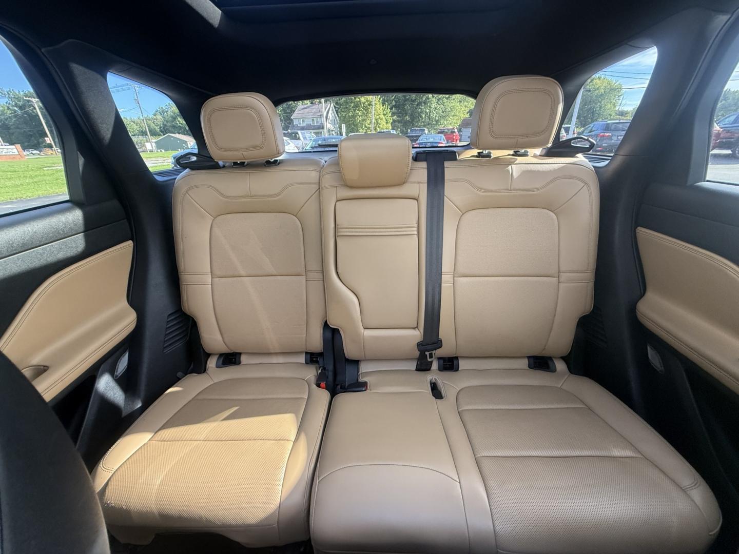 2021 White /Brown Lincoln Corsair Reserve AWD (5LMCJ2D98MU) with an 2.0L I4 DOHC 16V Turbo engine, Automatic transmission, located at 547 E. Main St., Orwell, OH, 44076, (440) 437-5893, 41.535435, -80.847855 - 2021 Lincoln Corsair Reserve AWD – Quiet Luxury in a Smaller, More Exclusive Package Lincoln is not a volume brand, and this 2021 Corsair Reserve AWD feels like it. Finished in Pristine White on 19" aluminum wheels, with full LED exterior lighting, it has the clean, composed presence of a luxury- Photo#22