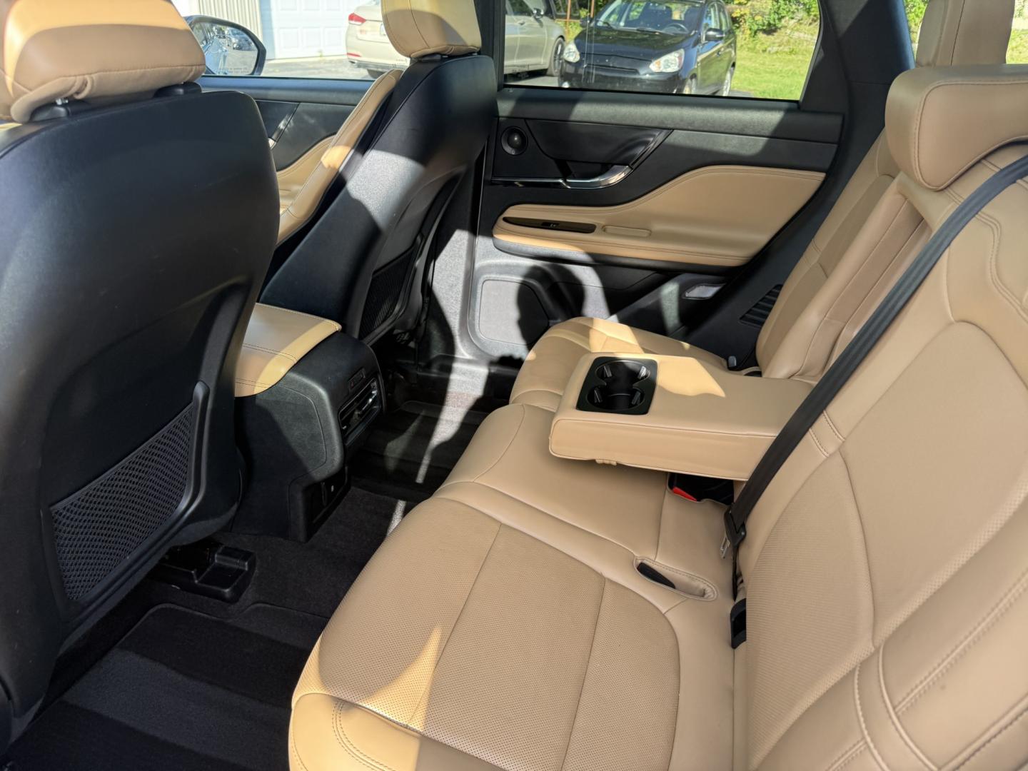 2021 White /Brown Lincoln Corsair Reserve AWD (5LMCJ2D98MU) with an 2.0L I4 DOHC 16V Turbo engine, Automatic transmission, located at 547 E. Main St., Orwell, OH, 44076, (440) 437-5893, 41.535435, -80.847855 - 2021 Lincoln Corsair Reserve AWD – Quiet Luxury in a Smaller, More Exclusive Package Lincoln is not a volume brand, and this 2021 Corsair Reserve AWD feels like it. Finished in Pristine White on 19" aluminum wheels, with full LED exterior lighting, it has the clean, composed presence of a luxury- Photo#23