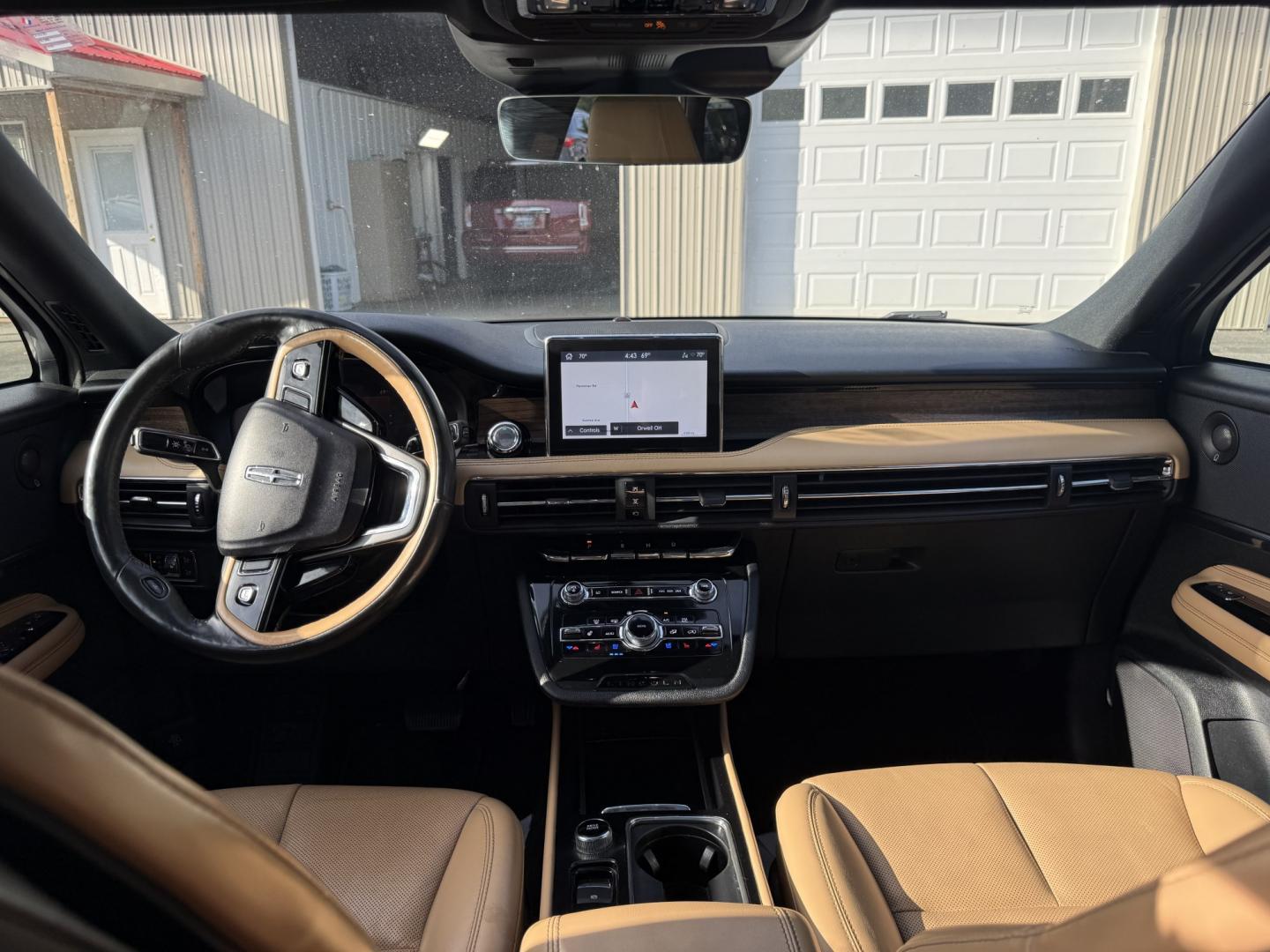 2021 White /Brown Lincoln Corsair Reserve AWD (5LMCJ2D98MU) with an 2.0L I4 DOHC 16V Turbo engine, Automatic transmission, located at 547 E. Main St., Orwell, OH, 44076, (440) 437-5893, 41.535435, -80.847855 - 2021 Lincoln Corsair Reserve AWD – Quiet Luxury in a Smaller, More Exclusive Package Lincoln is not a volume brand, and this 2021 Corsair Reserve AWD feels like it. Finished in Pristine White on 19" aluminum wheels, with full LED exterior lighting, it has the clean, composed presence of a luxury- Photo#26