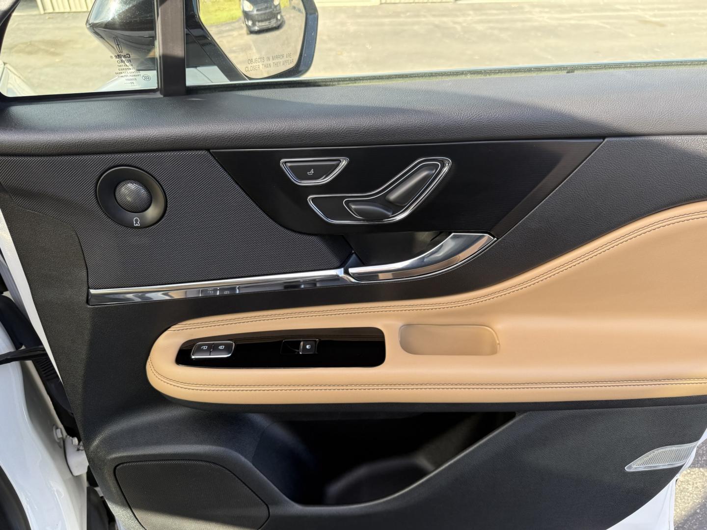 2021 White /Brown Lincoln Corsair Reserve AWD (5LMCJ2D98MU) with an 2.0L I4 DOHC 16V Turbo engine, Automatic transmission, located at 547 E. Main St., Orwell, OH, 44076, (440) 437-5893, 41.535435, -80.847855 - 2021 Lincoln Corsair Reserve AWD – Quiet Luxury in a Smaller, More Exclusive Package Lincoln is not a volume brand, and this 2021 Corsair Reserve AWD feels like it. Finished in Pristine White on 19" aluminum wheels, with full LED exterior lighting, it has the clean, composed presence of a luxury- Photo#45
