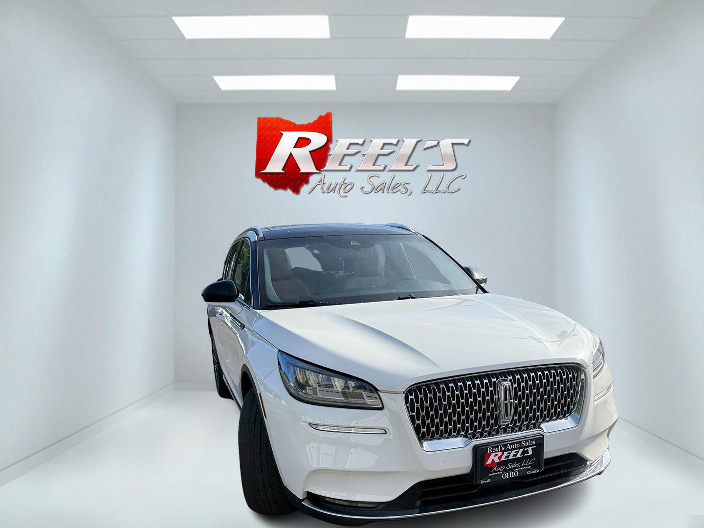 2021 White /Brown Lincoln Corsair Reserve AWD (5LMCJ2D98MU) with an 2.0L I4 DOHC 16V Turbo engine, Automatic transmission, located at 547 E. Main St., Orwell, OH, 44076, (440) 437-5893, 41.535435, -80.847855 - 2021 Lincoln Corsair Reserve AWD – Quiet Luxury in a Smaller, More Exclusive Package Lincoln is not a volume brand, and this 2021 Corsair Reserve AWD feels like it. Finished in Pristine White on 19" aluminum wheels, with full LED exterior lighting, it has the clean, composed presence of a luxury- Photo#2