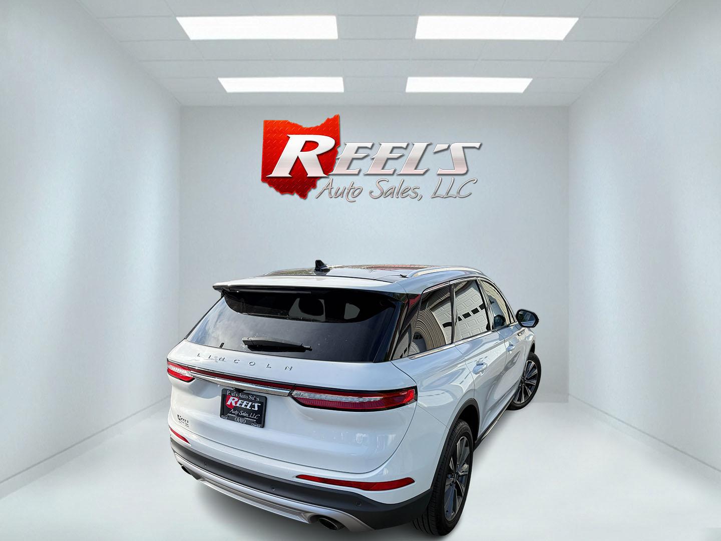 2021 White /Brown Lincoln Corsair Reserve AWD (5LMCJ2D98MU) with an 2.0L I4 DOHC 16V Turbo engine, Automatic transmission, located at 547 E. Main St., Orwell, OH, 44076, (440) 437-5893, 41.535435, -80.847855 - 2021 Lincoln Corsair Reserve AWD – Quiet Luxury in a Smaller, More Exclusive Package Lincoln is not a volume brand, and this 2021 Corsair Reserve AWD feels like it. Finished in Pristine White on 19" aluminum wheels, with full LED exterior lighting, it has the clean, composed presence of a luxury- Photo#32