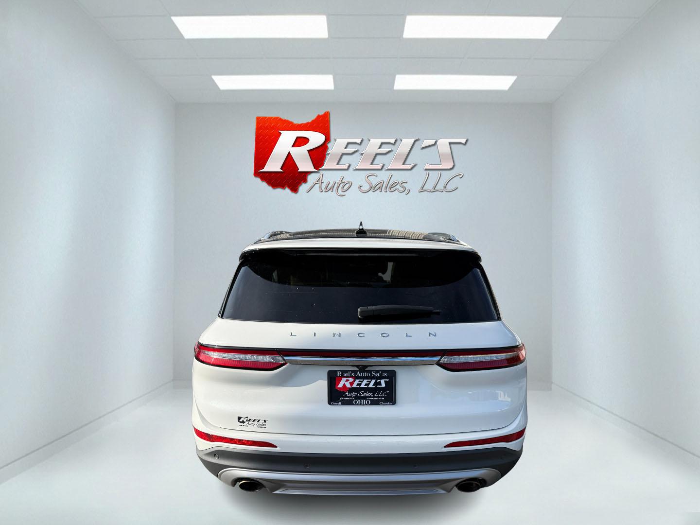 2021 White /Brown Lincoln Corsair Reserve AWD (5LMCJ2D98MU) with an 2.0L I4 DOHC 16V Turbo engine, Automatic transmission, located at 547 E. Main St., Orwell, OH, 44076, (440) 437-5893, 41.535435, -80.847855 - 2021 Lincoln Corsair Reserve AWD – Quiet Luxury in a Smaller, More Exclusive Package Lincoln is not a volume brand, and this 2021 Corsair Reserve AWD feels like it. Finished in Pristine White on 19" aluminum wheels, with full LED exterior lighting, it has the clean, composed presence of a luxury- Photo#33