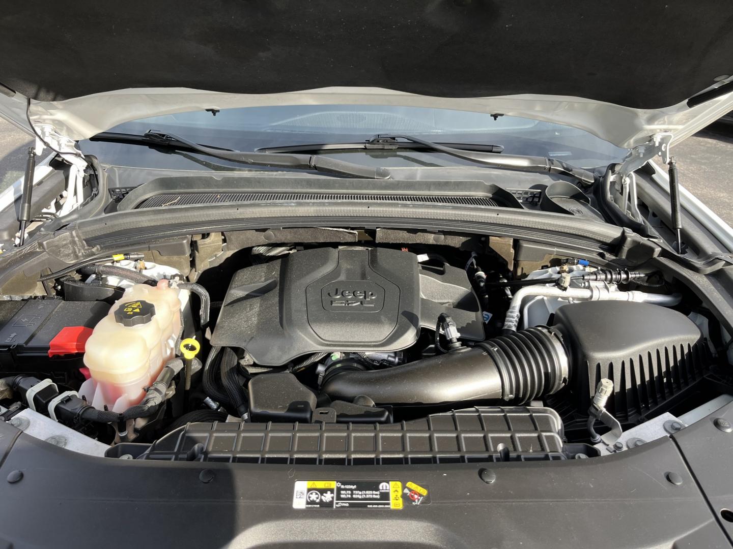 2022 White /Brown Jeep Grand Cherokee L Summit 4WD (1C4RJKET7N8) with an 5.7L V8 OHV 16V engine, Automatic transmission, located at 11115 Chardon Rd. , Chardon, OH, 44024, (440) 214-9705, 41.580246, -81.241943 - 2022 Jeep Grand Cherokee L Summit Reserve 4x4 – Rare Luxury, Real Capability, and Flagship Presence This is not a typical family SUV. The 2022 Grand Cherokee L Summit Reserve 4x4 is the most exclusive version of Jeep’s three-row flagship — the one built for buyers who want first-class comfort- Photo#12