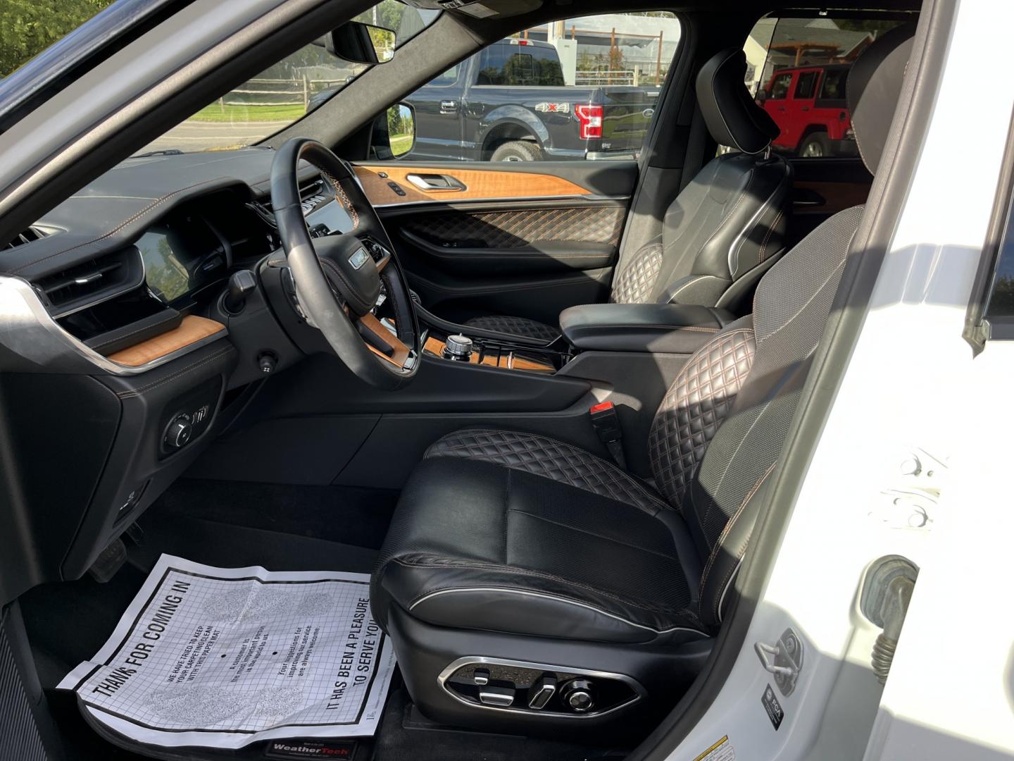 2022 White /Brown Jeep Grand Cherokee L Summit 4WD (1C4RJKET7N8) with an 5.7L V8 OHV 16V engine, Automatic transmission, located at 11115 Chardon Rd. , Chardon, OH, 44024, (440) 214-9705, 41.580246, -81.241943 - 2022 Jeep Grand Cherokee L Summit Reserve 4x4 – Rare Luxury, Real Capability, and Flagship Presence This is not a typical family SUV. The 2022 Grand Cherokee L Summit Reserve 4x4 is the most exclusive version of Jeep’s three-row flagship — the one built for buyers who want first-class comfort- Photo#20